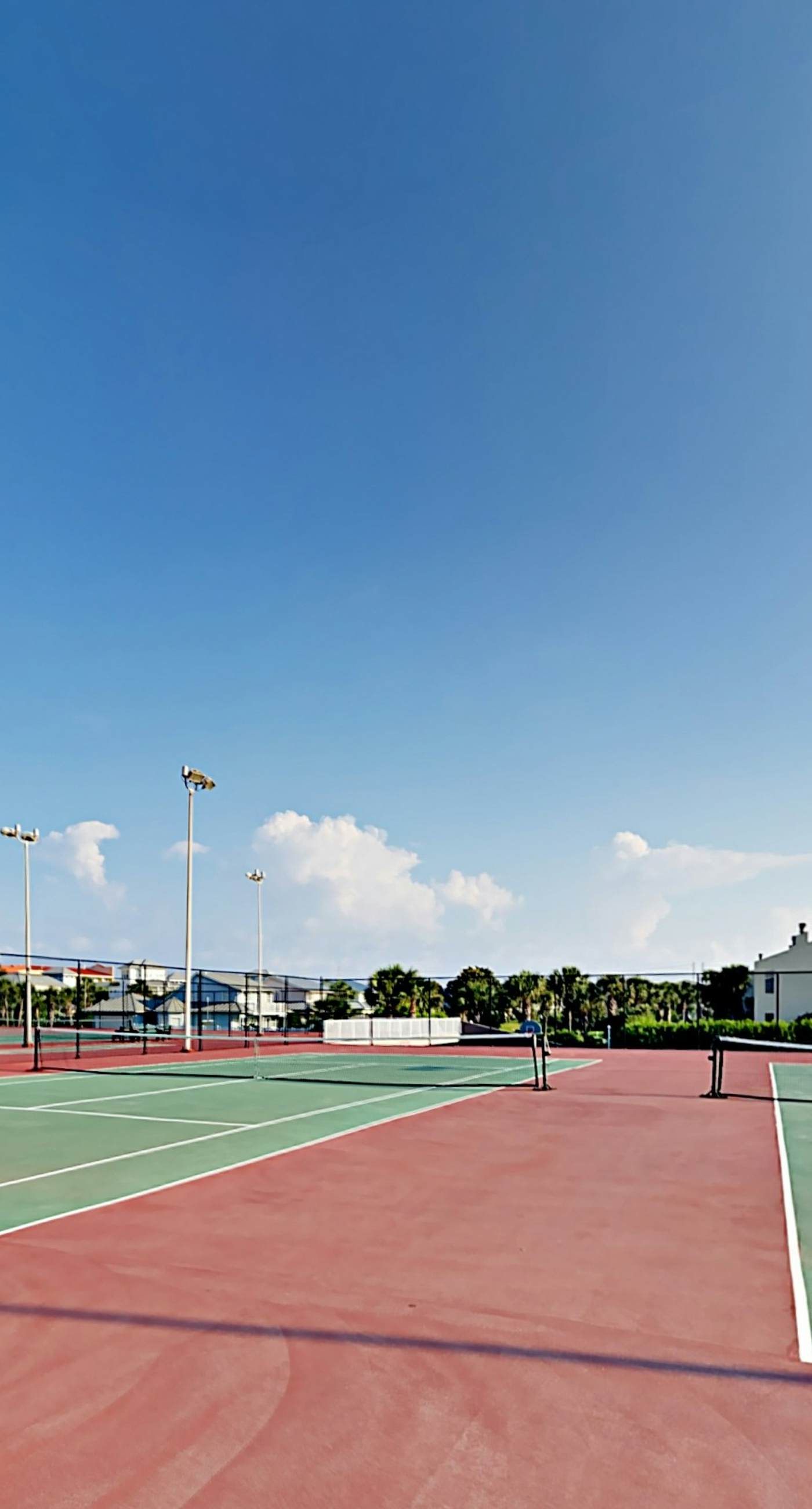 6th-floor coastal, bright condo - beach service included, steps to restaurants