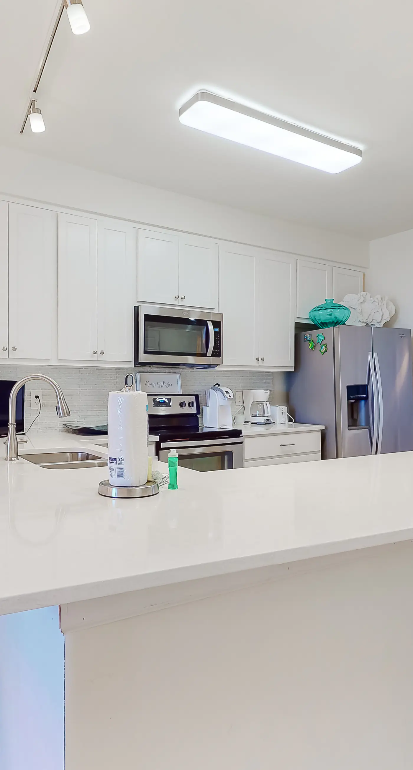 Amazing second-floor condo with Gulf View, fitness center, pools & beach access