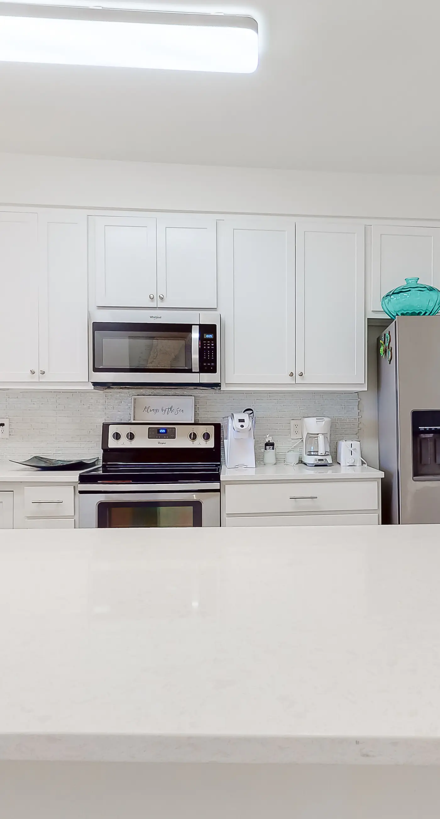 Amazing second-floor condo with Gulf View, fitness center, pools & beach access