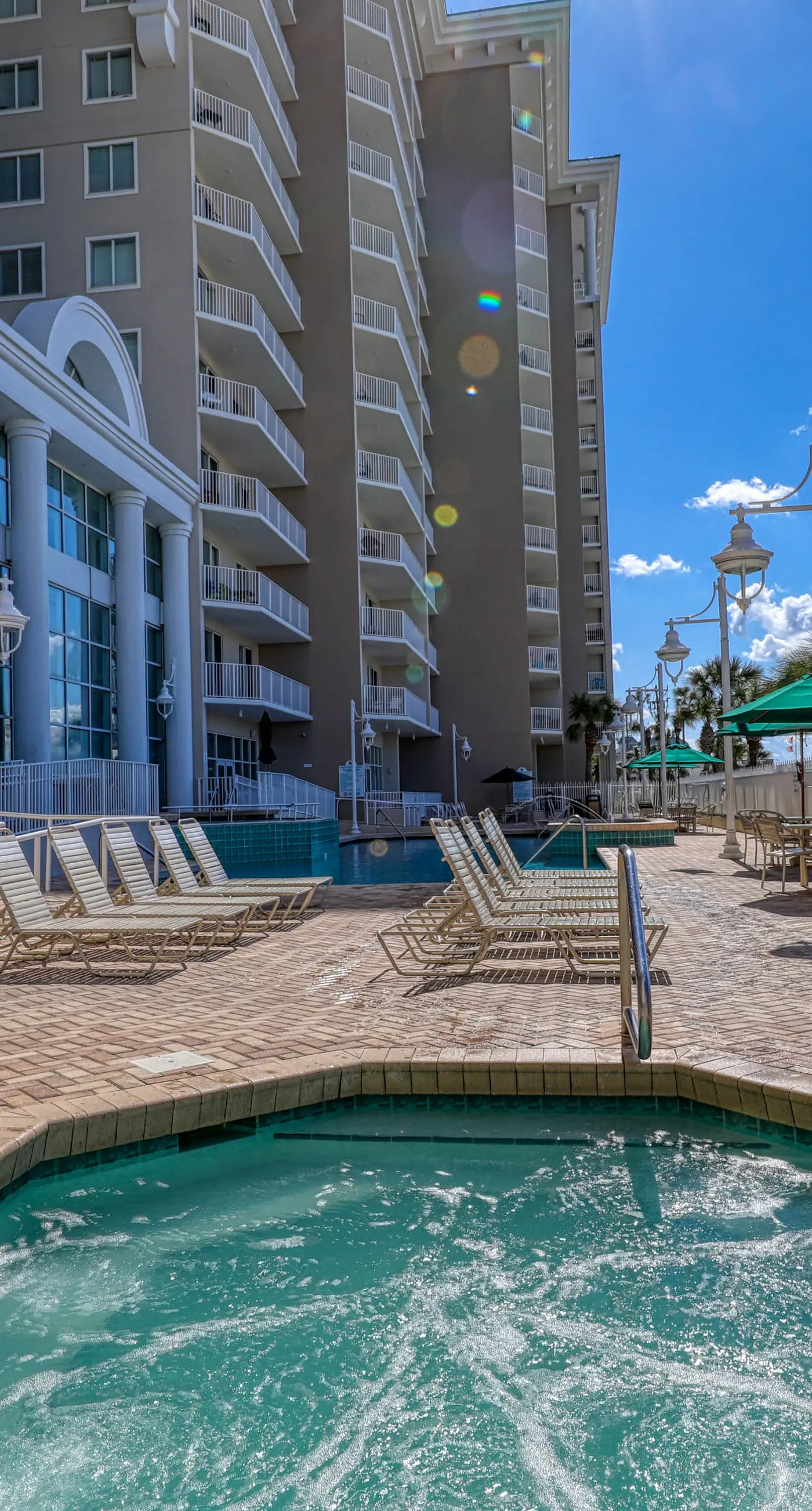 Large, beachfront condo w/ a furnished balcony, shared pools, hot tub, & tennis