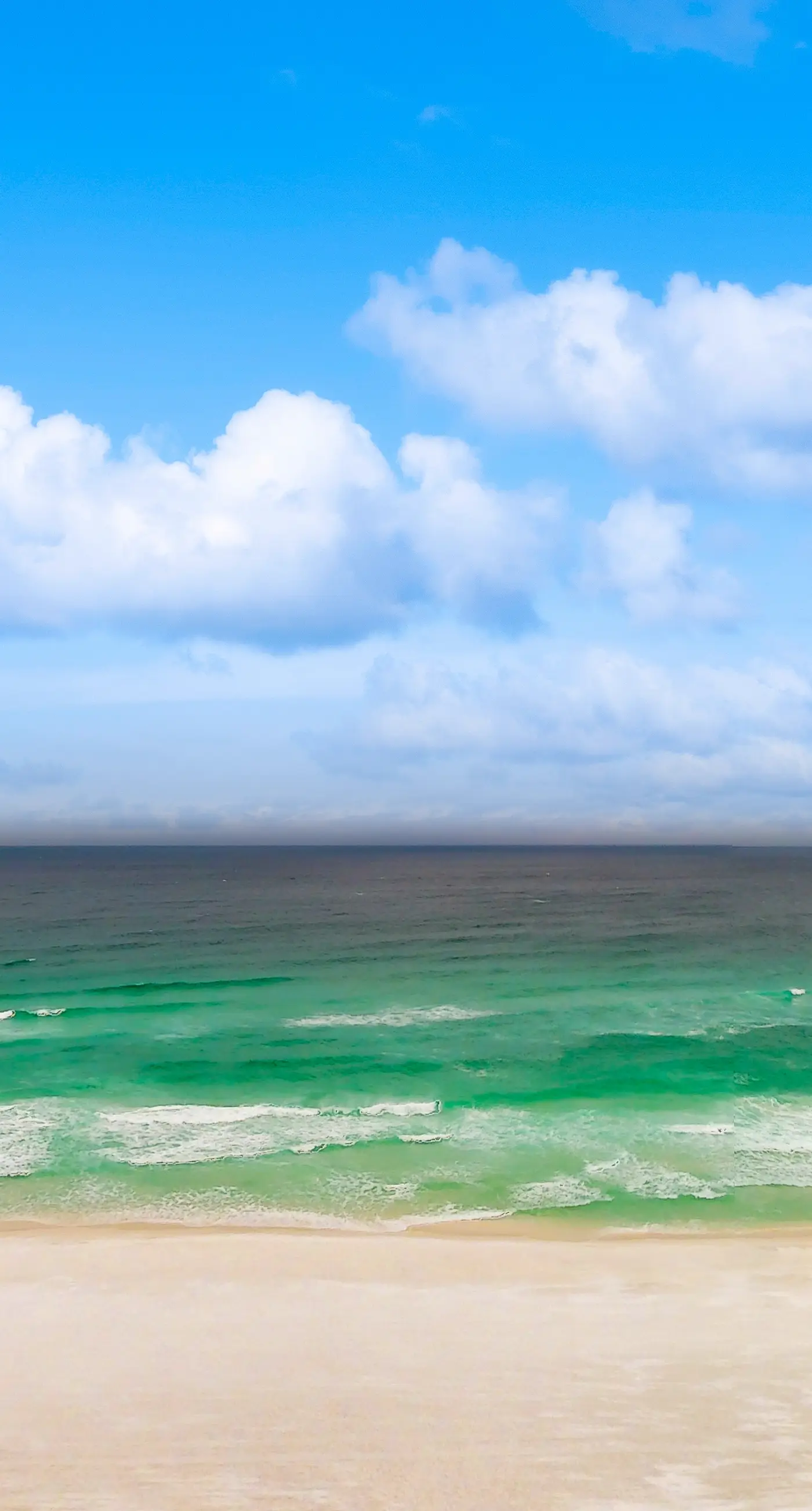 Large, beachfront condo w/ a furnished balcony, shared pools, hot tub, & tennis