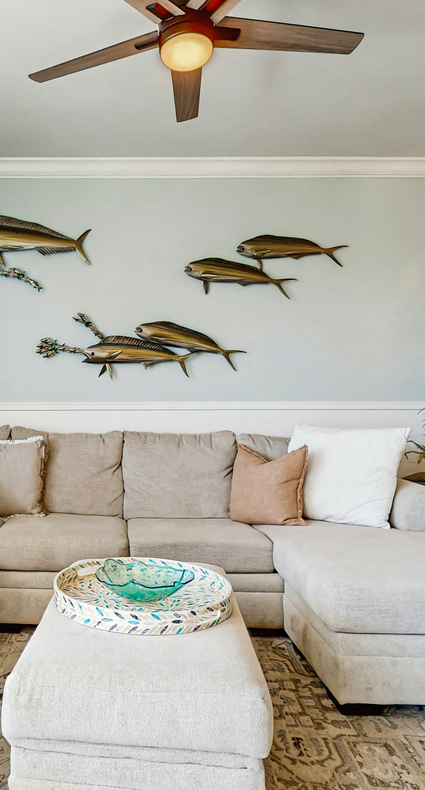 Gulf-front condo with balcony and access to pools, hot tub, gym, & private beach