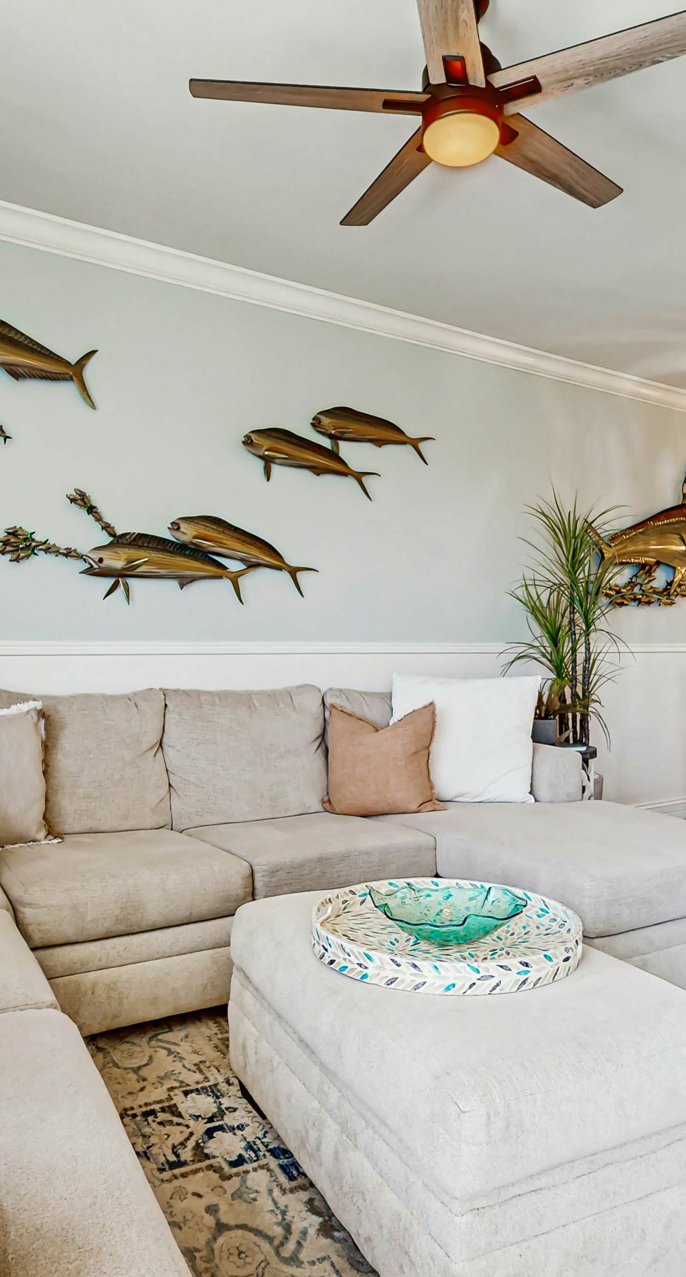 Gulf-front condo with balcony and access to pools, hot tub, gym, & private beach