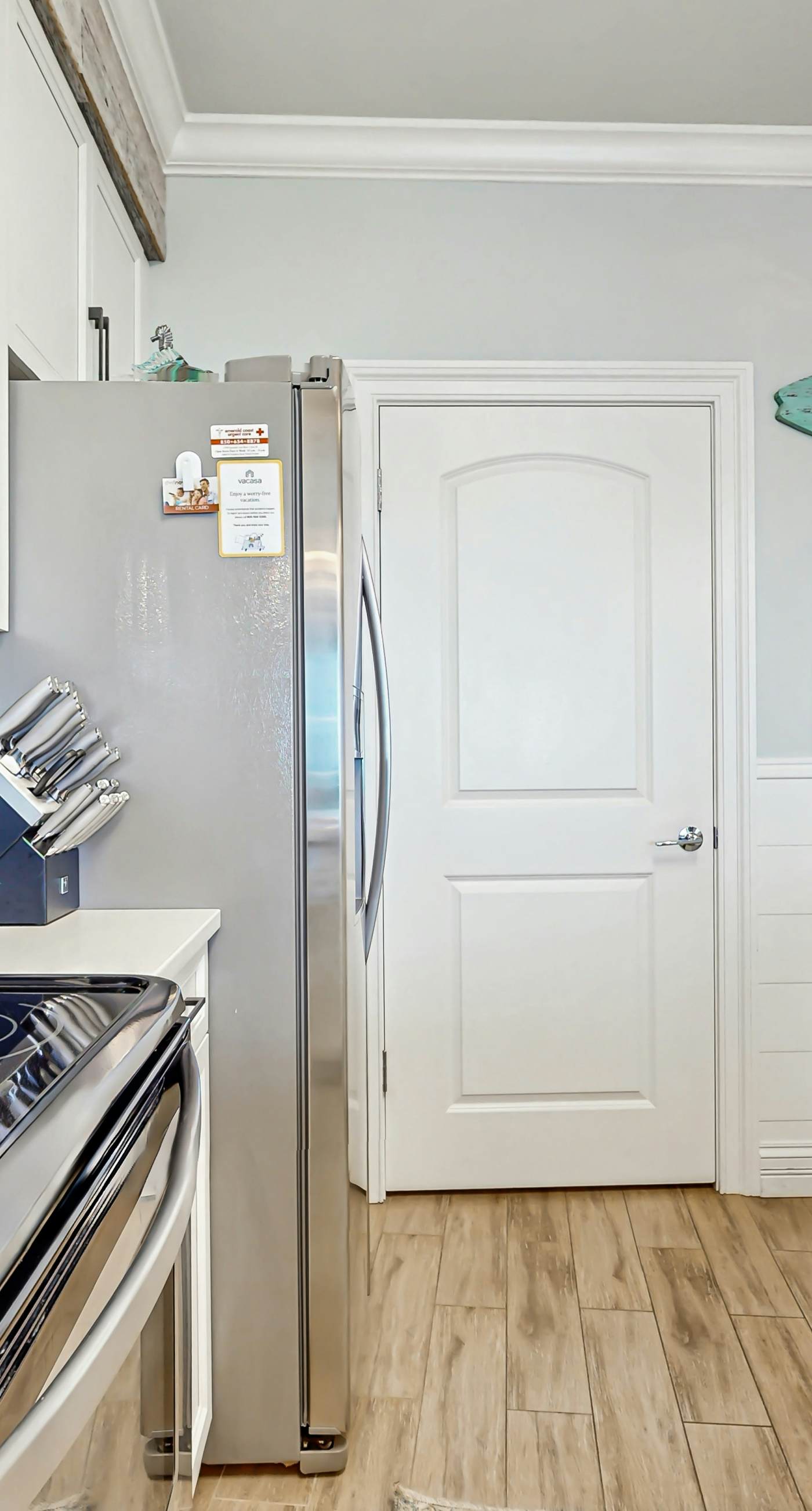 Gulf-front condo with balcony and access to pools, hot tub, gym, & private beach