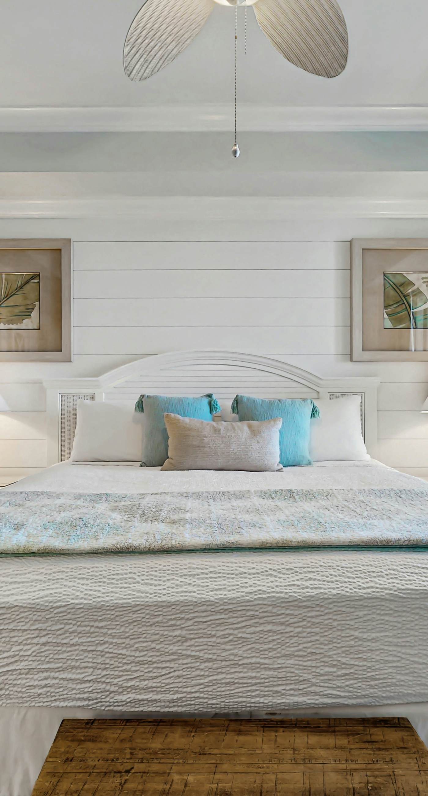 Gulf-front condo with balcony and access to pools, hot tub, gym, & private beach