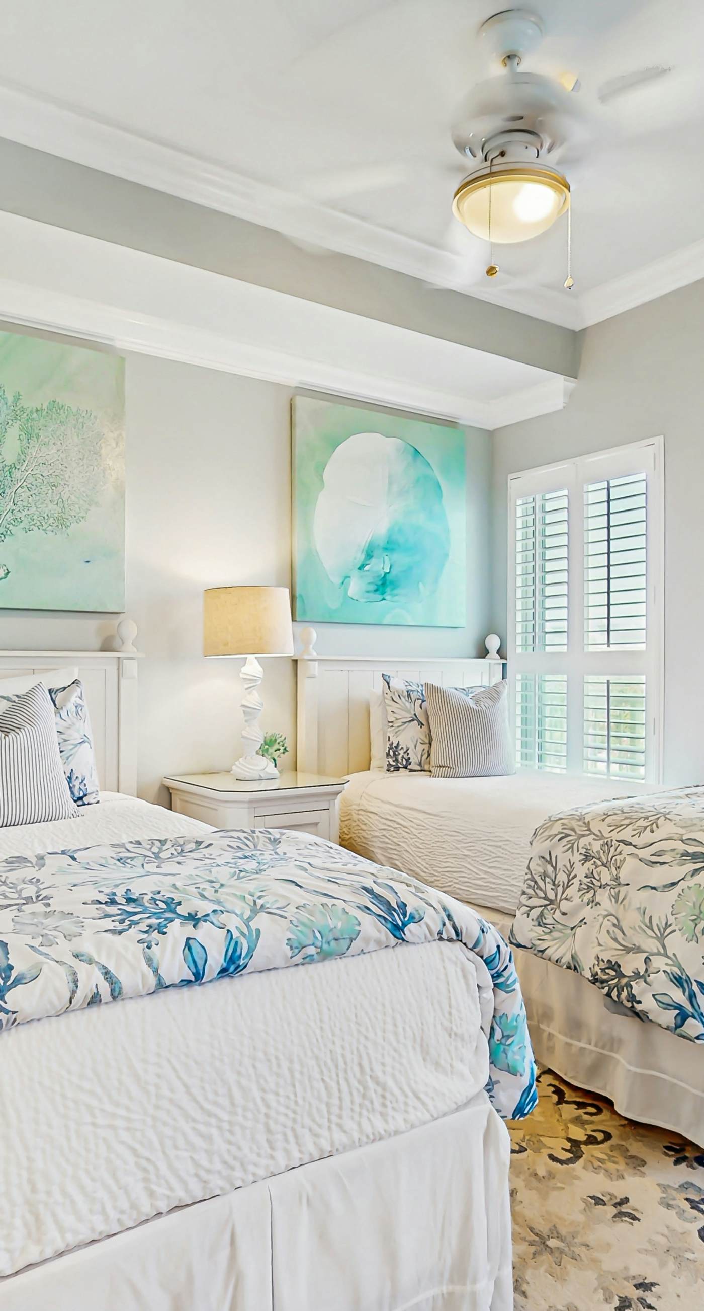 Gulf-front condo with balcony and access to pools, hot tub, gym, & private beach