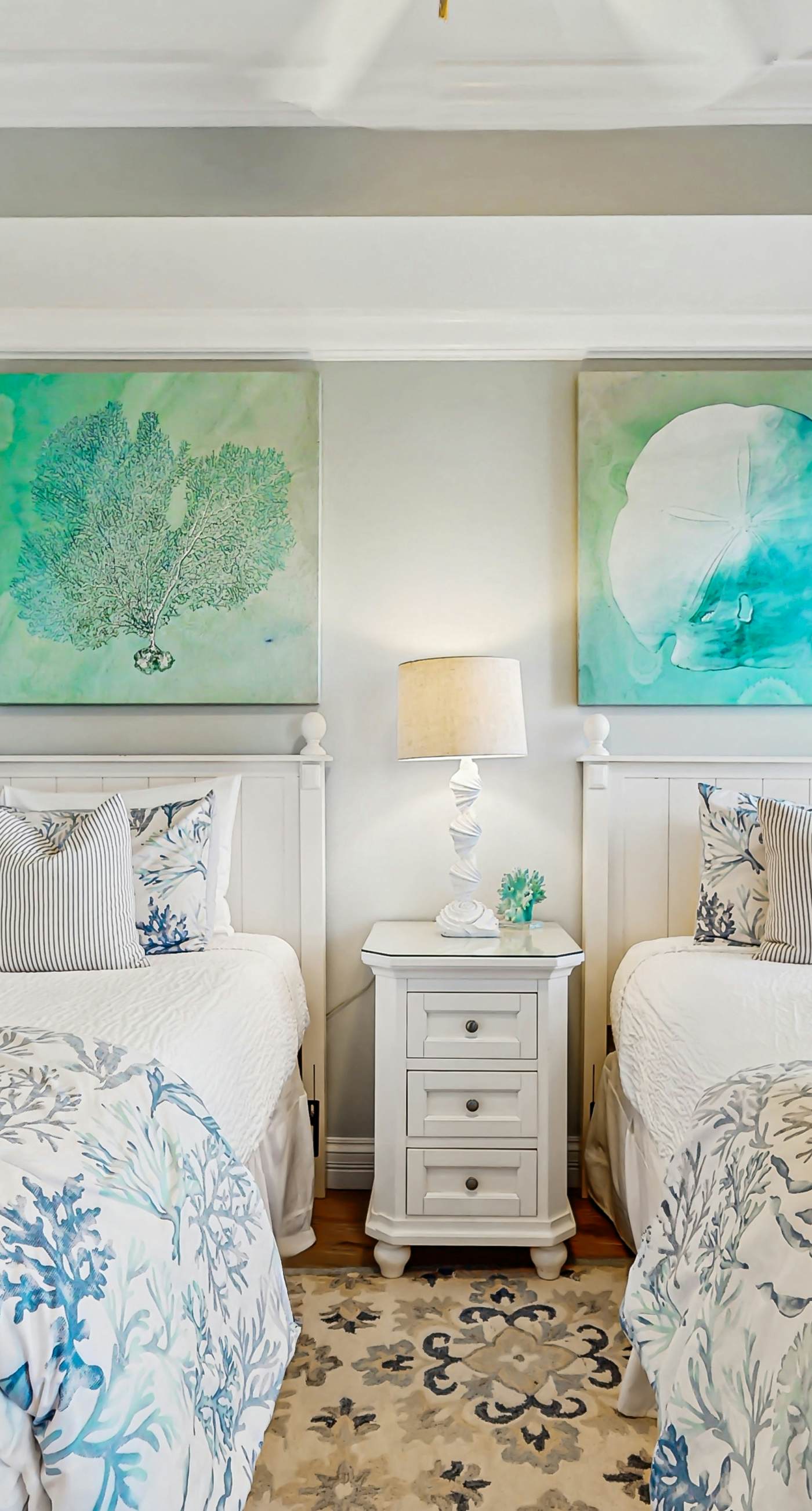 Gulf-front condo with balcony and access to pools, hot tub, gym, & private beach