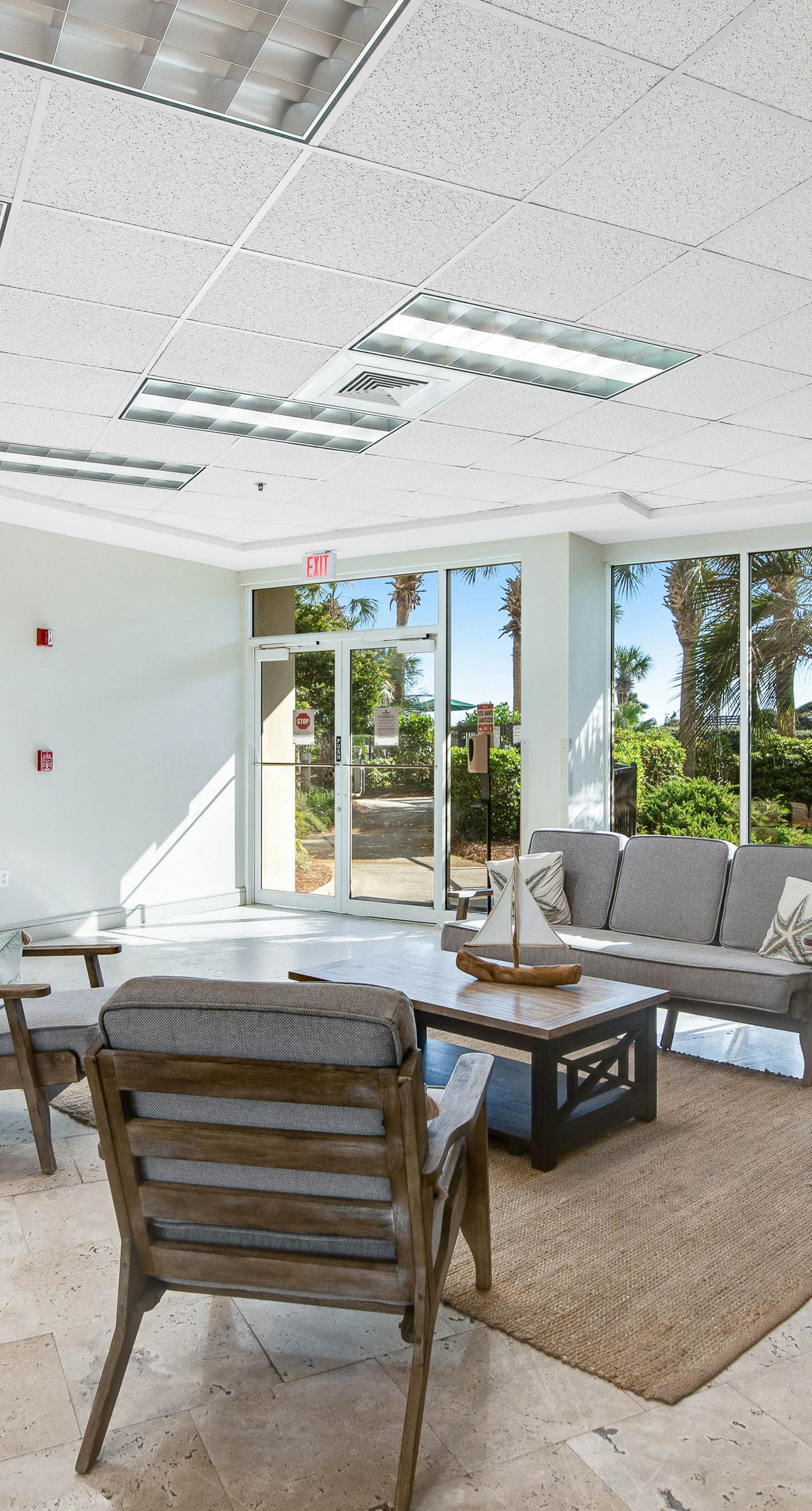 Gulf-front condo with balcony and access to pools, hot tub, gym, & private beach