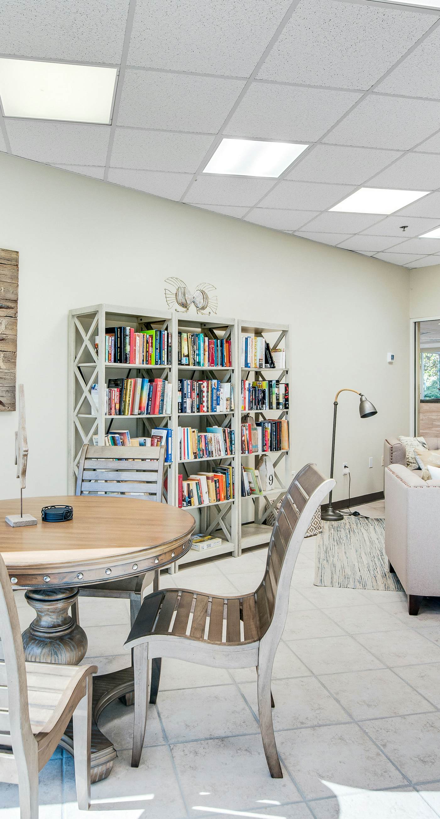 Gulf-front condo with balcony and access to pools, hot tub, gym, & private beach