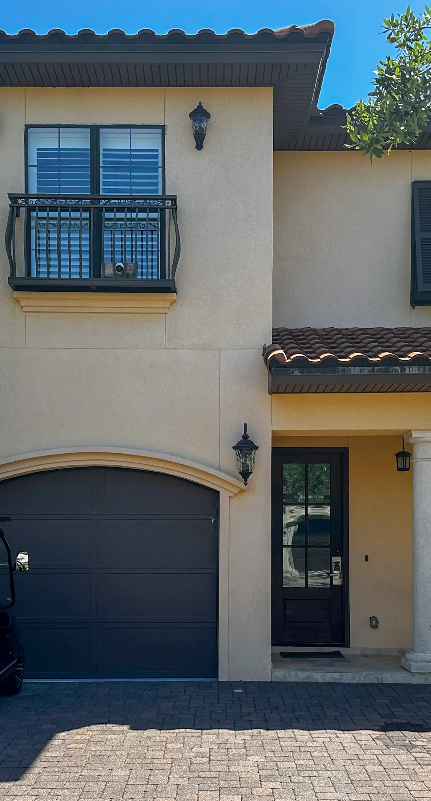 Lakefront Mediterranean-style home with pool, tennis & 6-seater golf cart