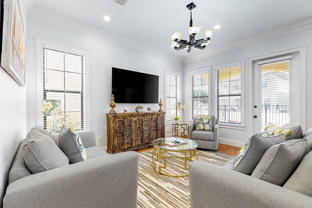 Lakefront Mediterranean-style home with pool, tennis & 6-seater golf cart
