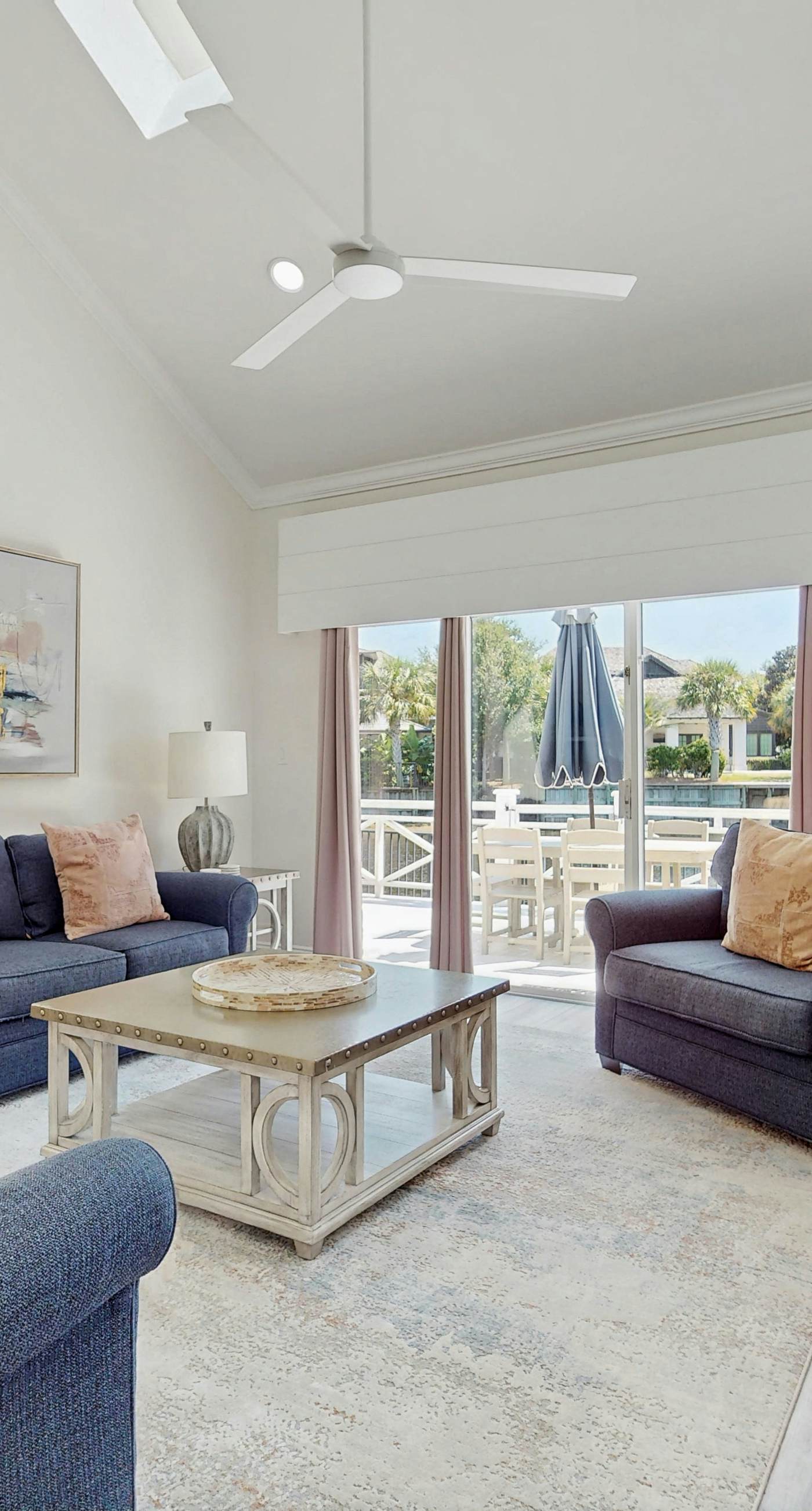 Gorgeous waterfront dog-friendly Villa with patio, deck, golf cart & shared pool