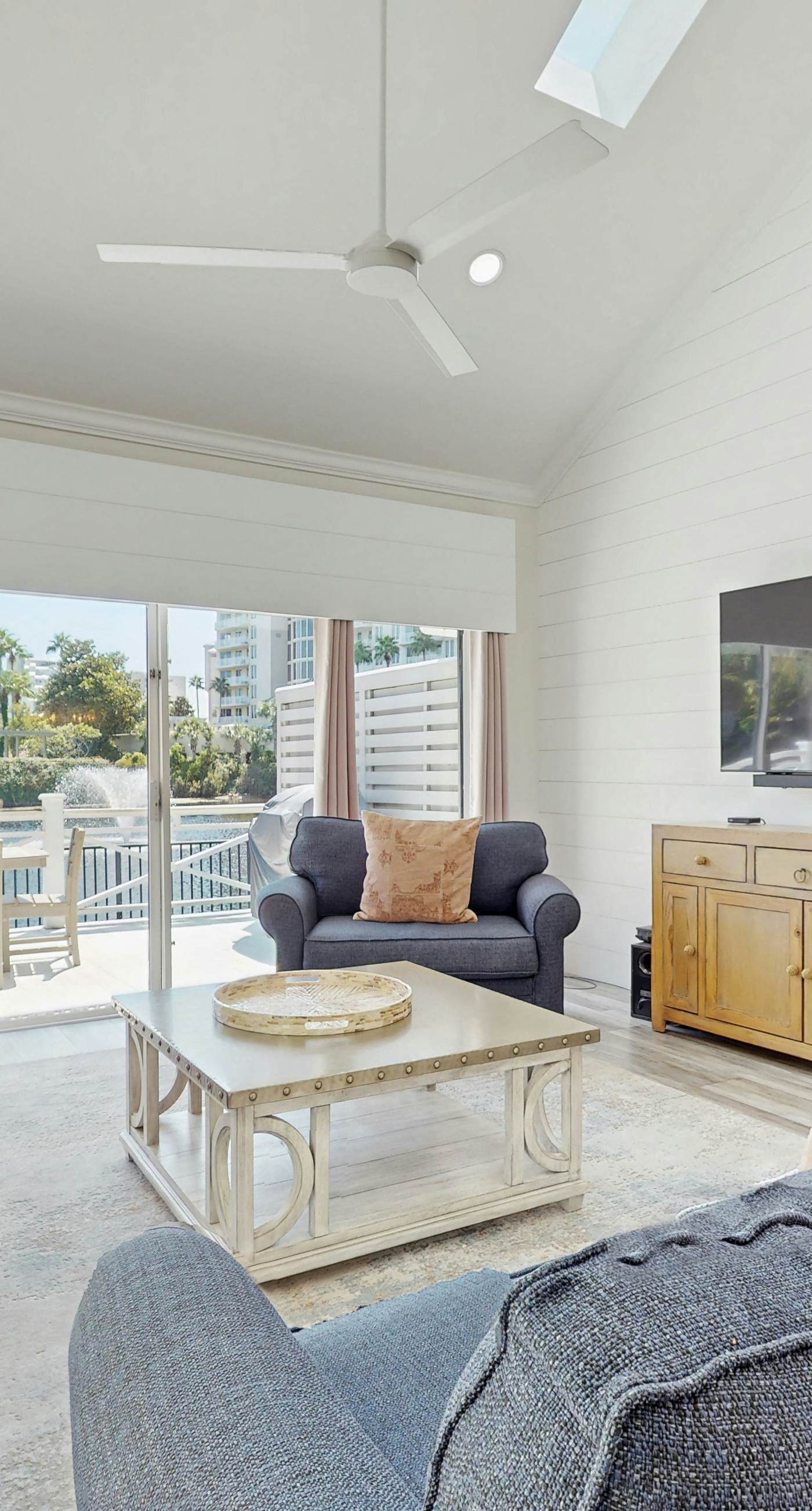 Gorgeous waterfront dog-friendly Villa with patio, deck, golf cart & shared pool