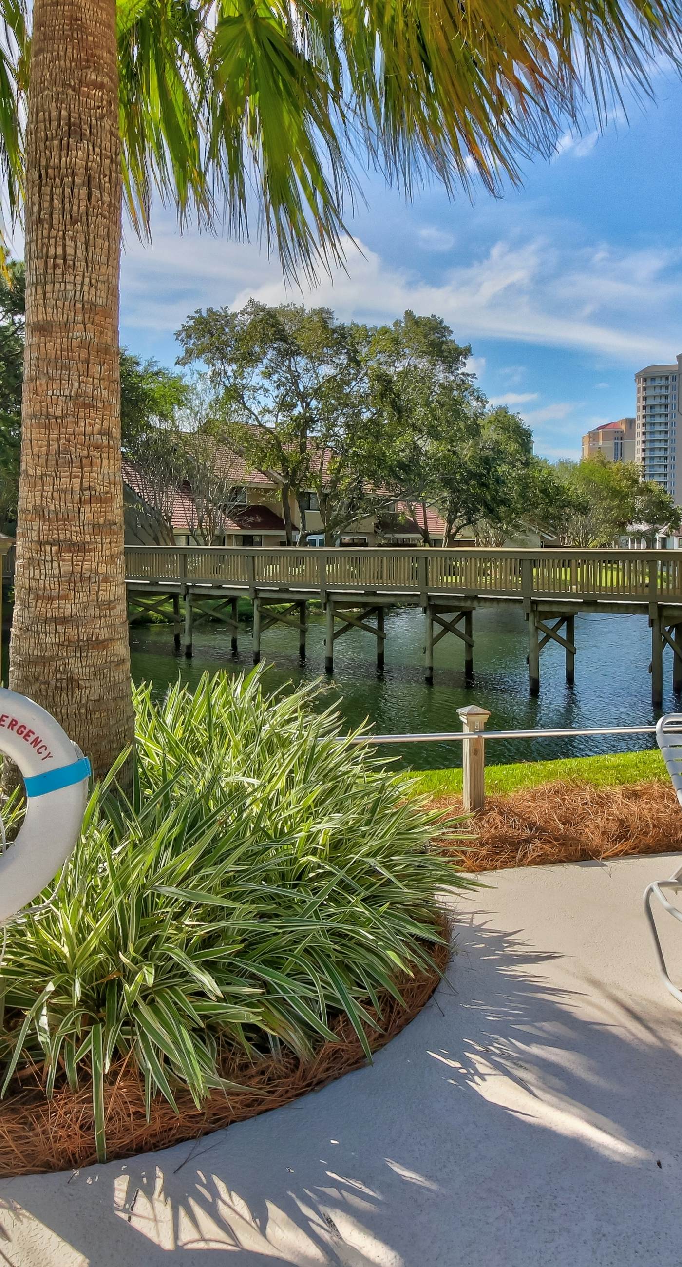 Gorgeous waterfront dog-friendly Villa with patio, deck, golf cart & shared pool