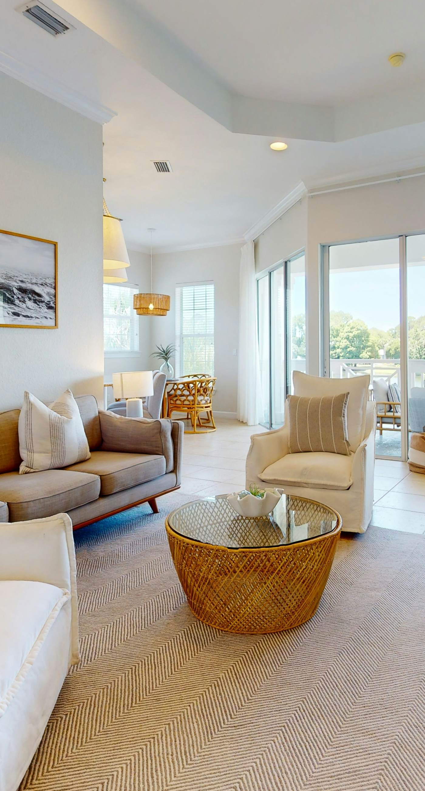 Lakefront condo with water-view balcony, private golf cart, resort pool & amenities