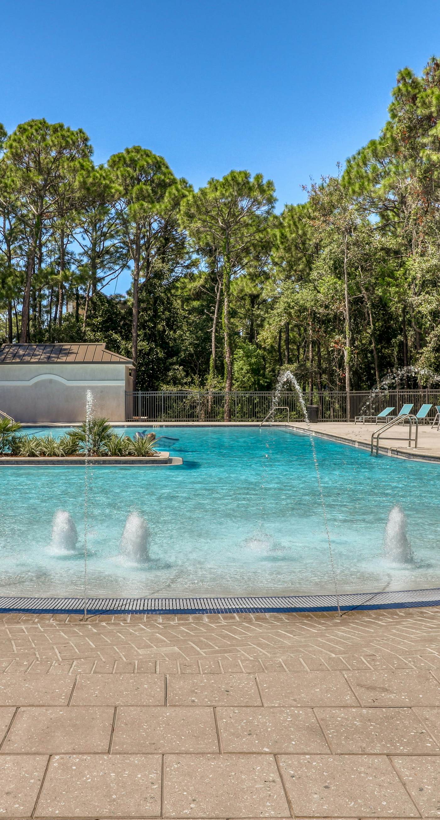 Lakefront condo with water-view balcony, private golf cart, resort pool & amenities