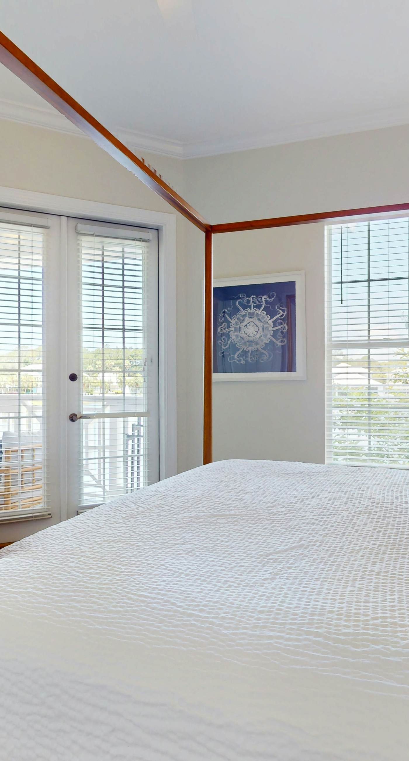 Lakefront condo with water-view balcony, private golf cart, resort pool & amenities