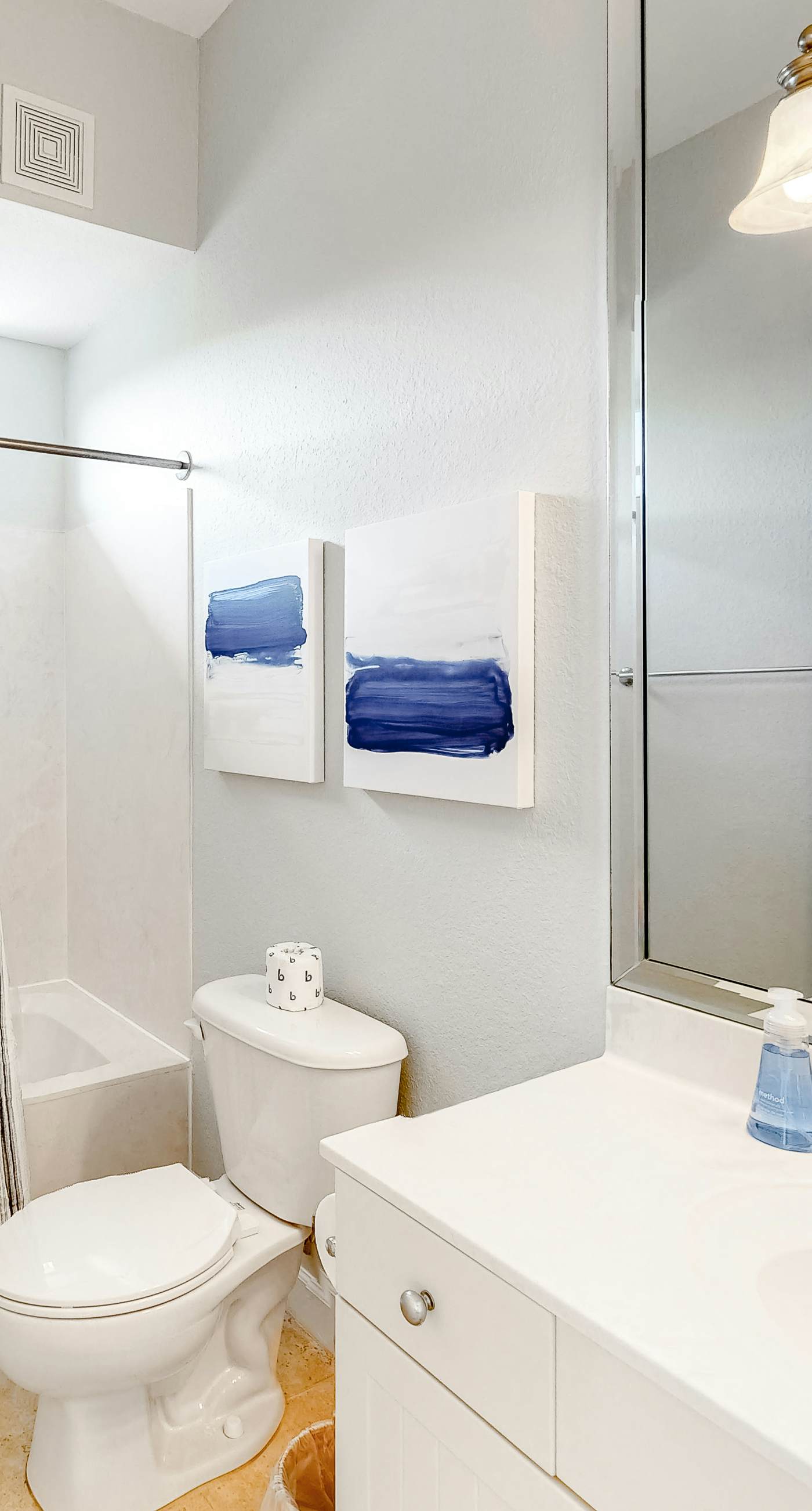 Lakefront condo with water-view balcony, private golf cart, resort pool & amenities