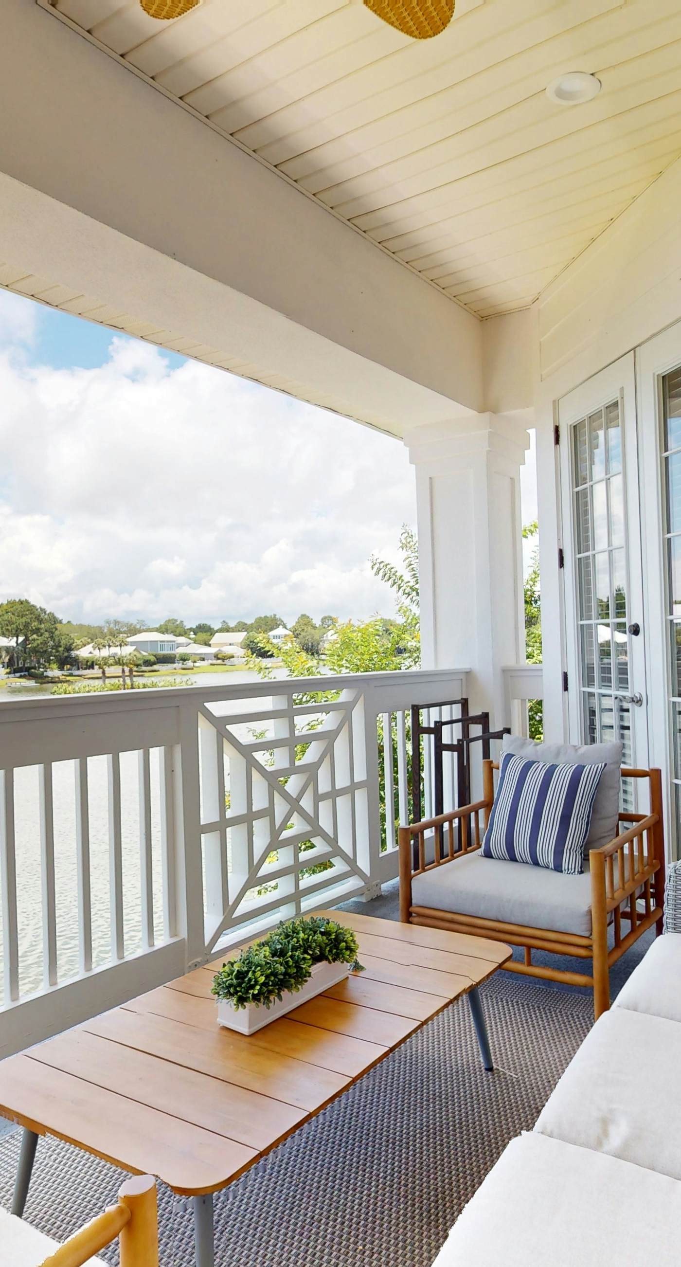 Lakefront condo with water-view balcony, private golf cart, resort pool & amenities