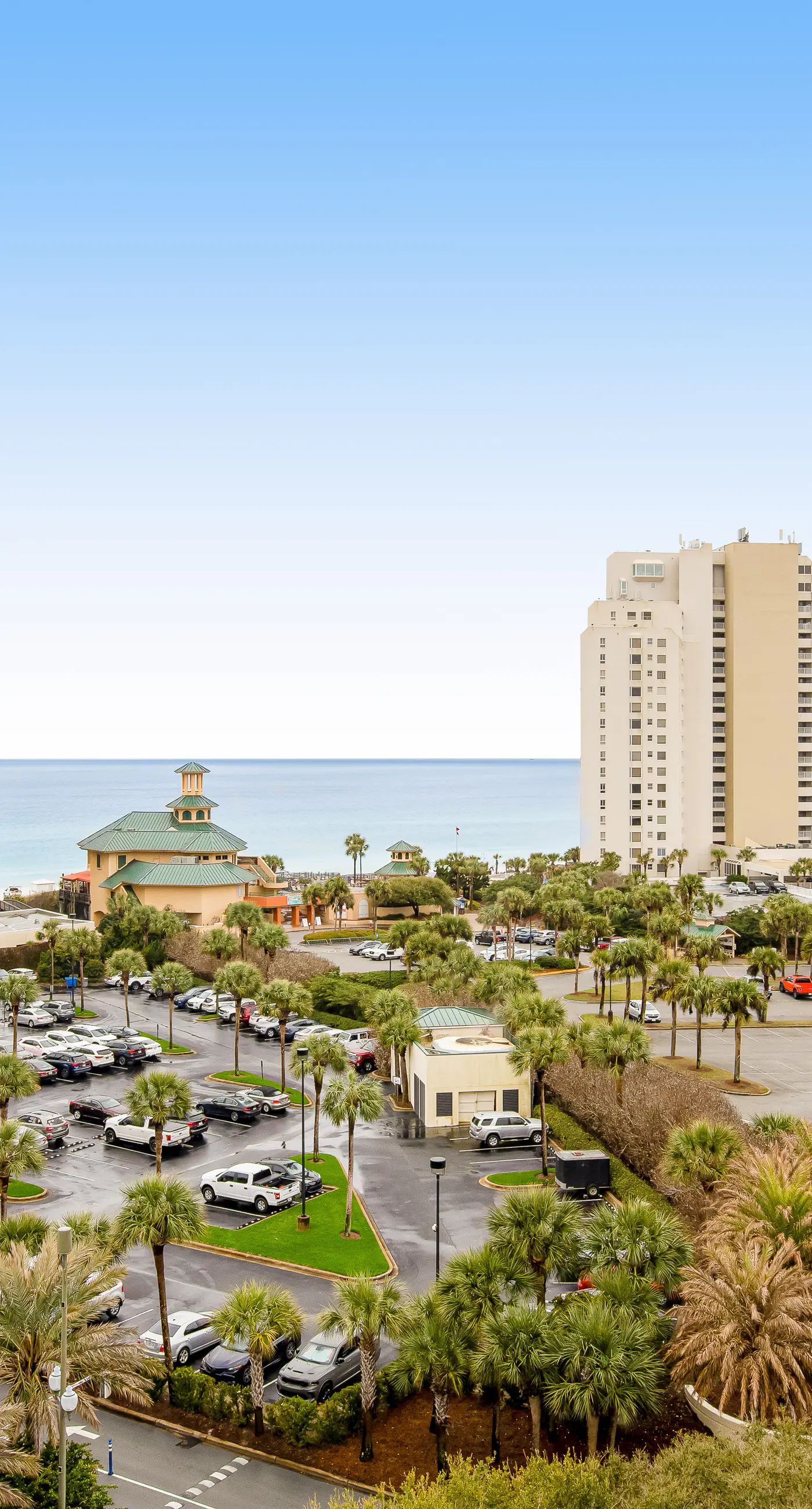 Ocean-view condo with wraparound balcony, W/D, pool, & hot tub