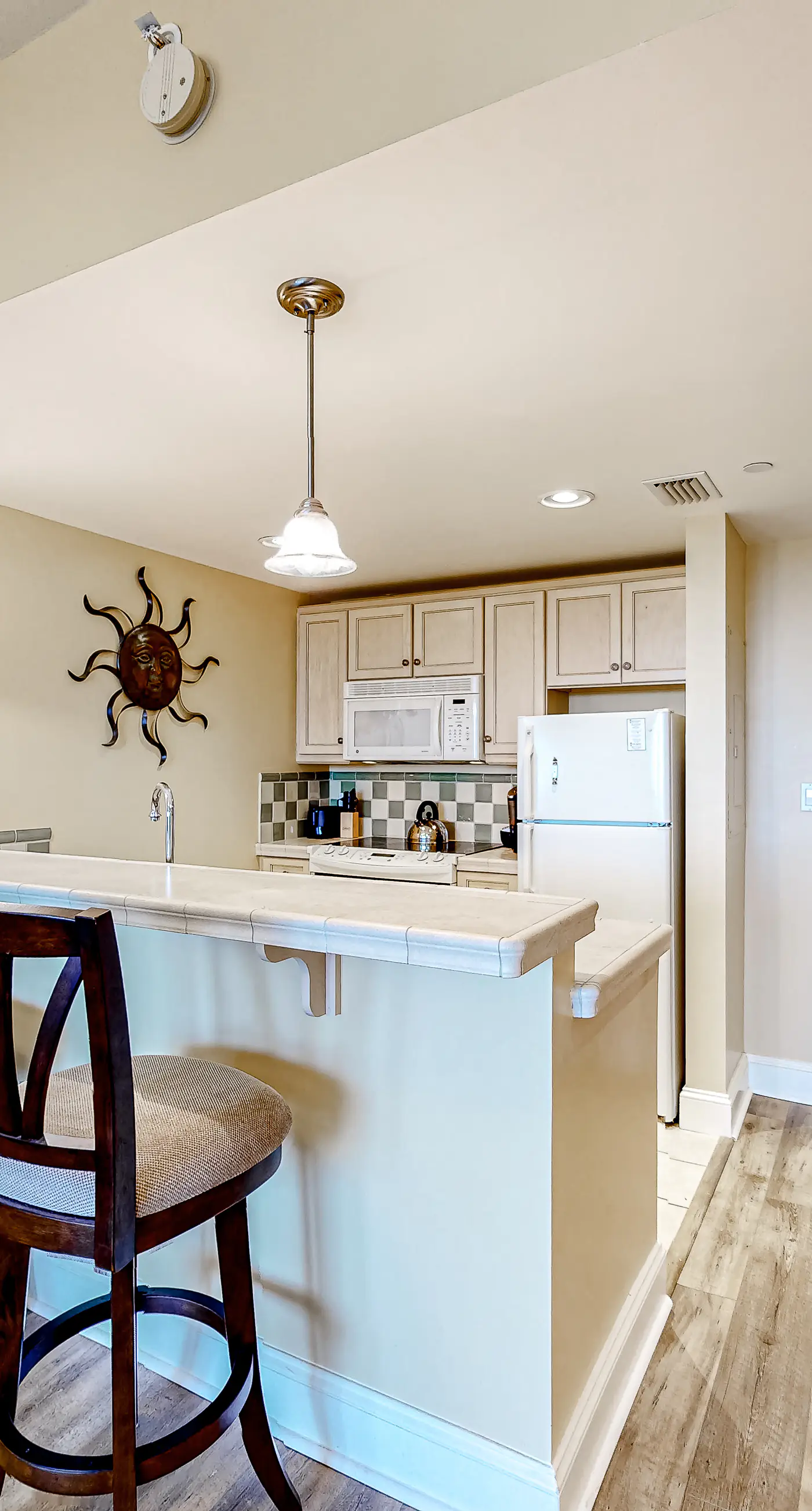 Bright condo with lagoon pool, hot tub, golf, private W/D & central AC