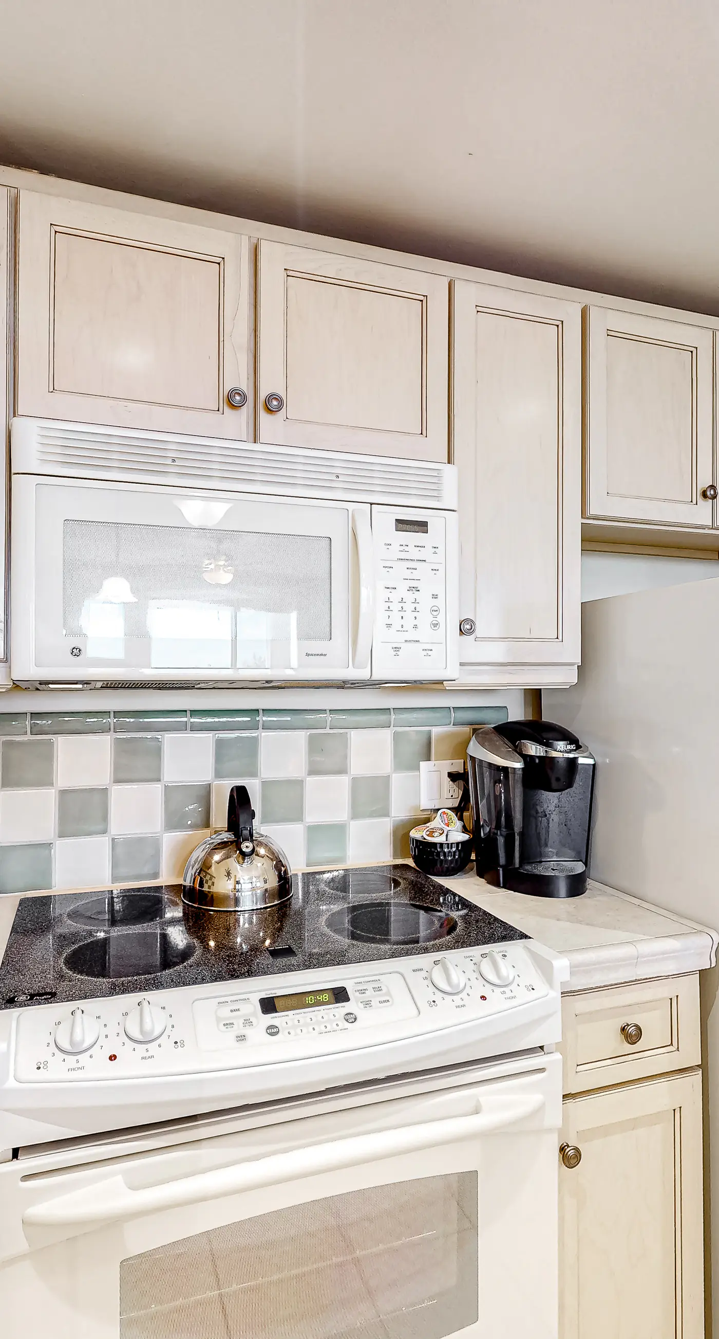 Bright condo with lagoon pool, hot tub, golf, private W/D & central AC