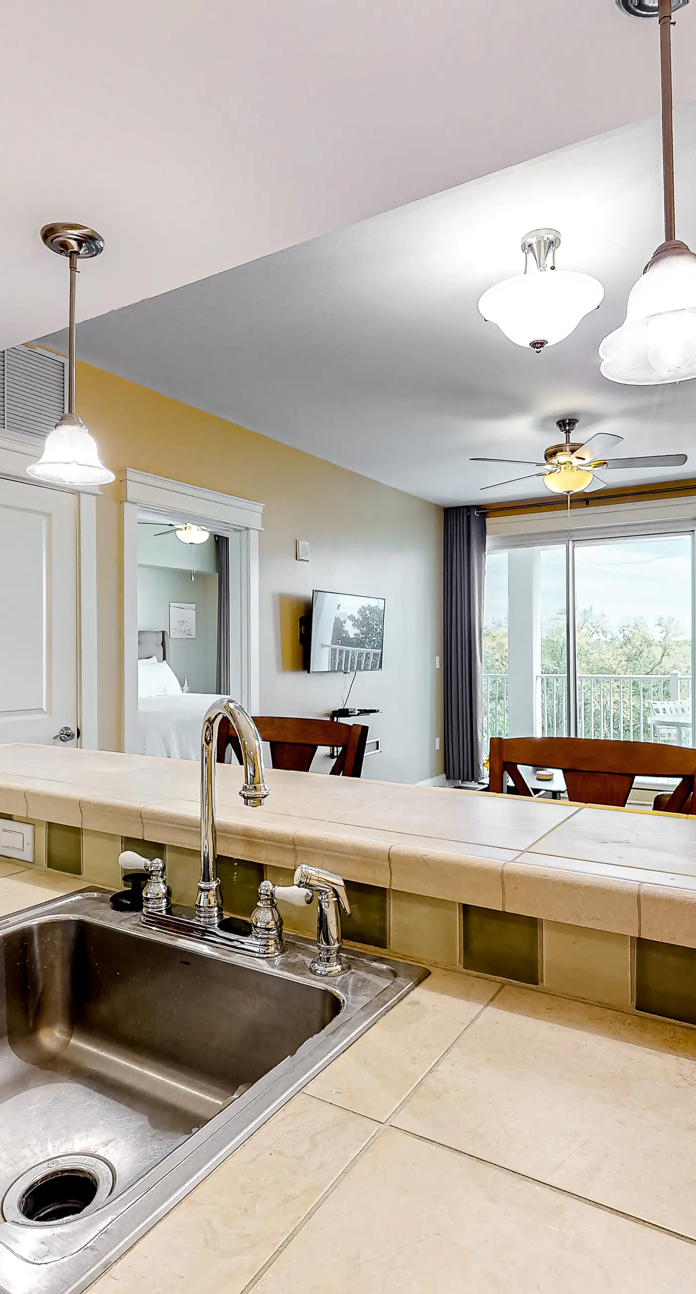 Bright condo with lagoon pool, hot tub, golf, private W/D & central AC