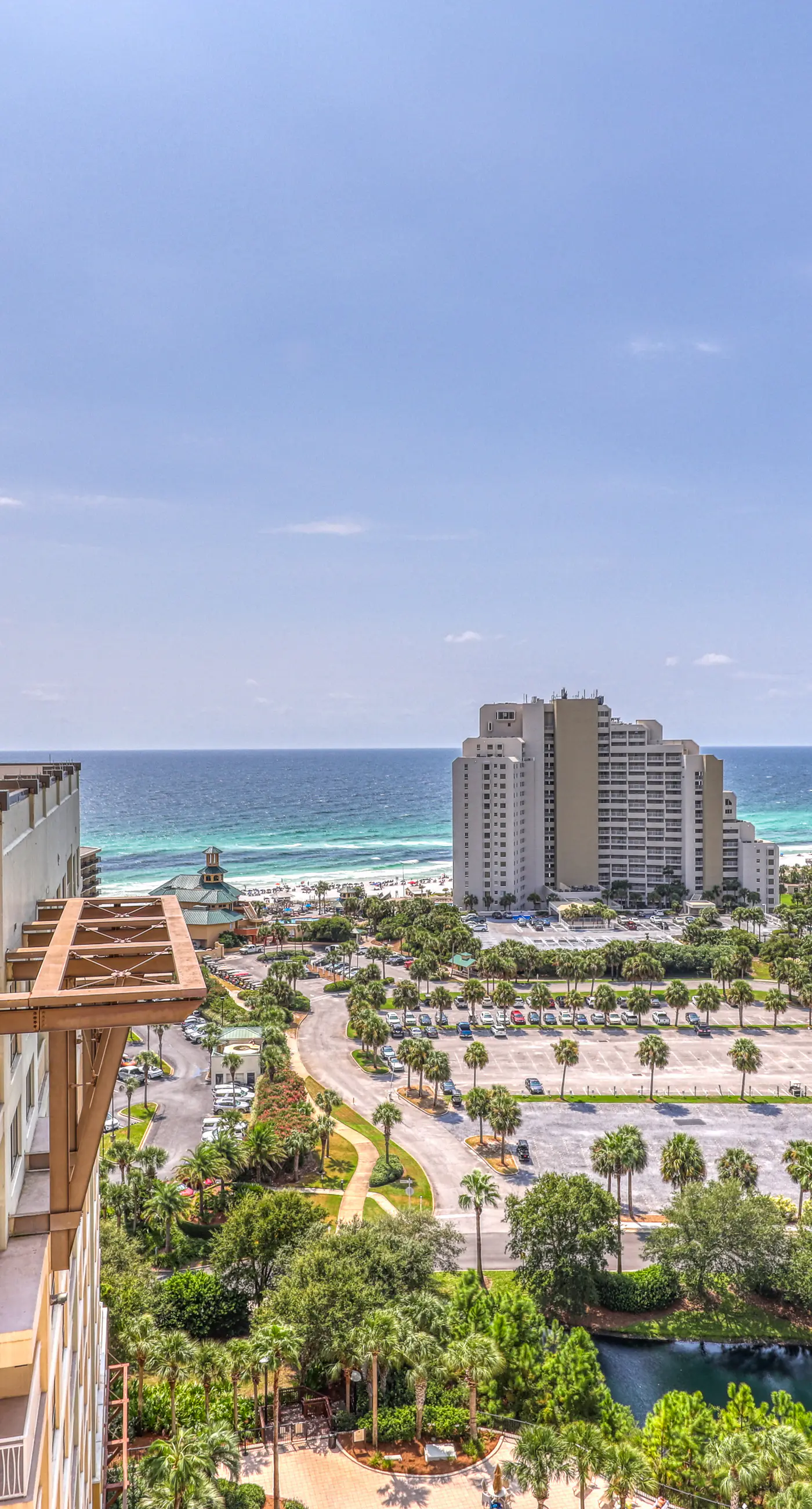 Gulf-view condo w/ corner balcony, shared pool, hot tub & easy beach access