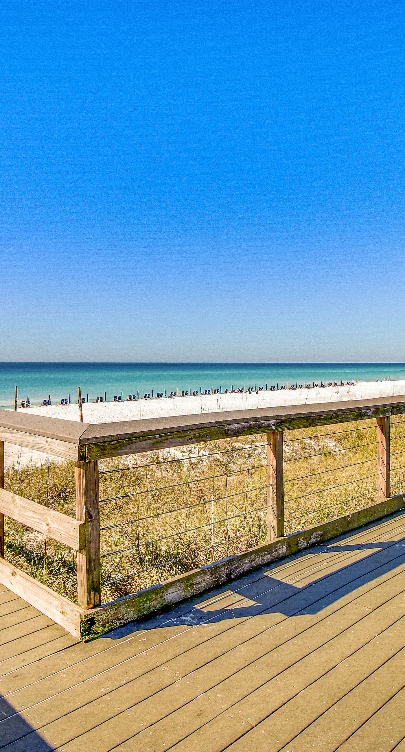 Gulf-view condo w/ corner balcony, shared pool, hot tub & easy beach access