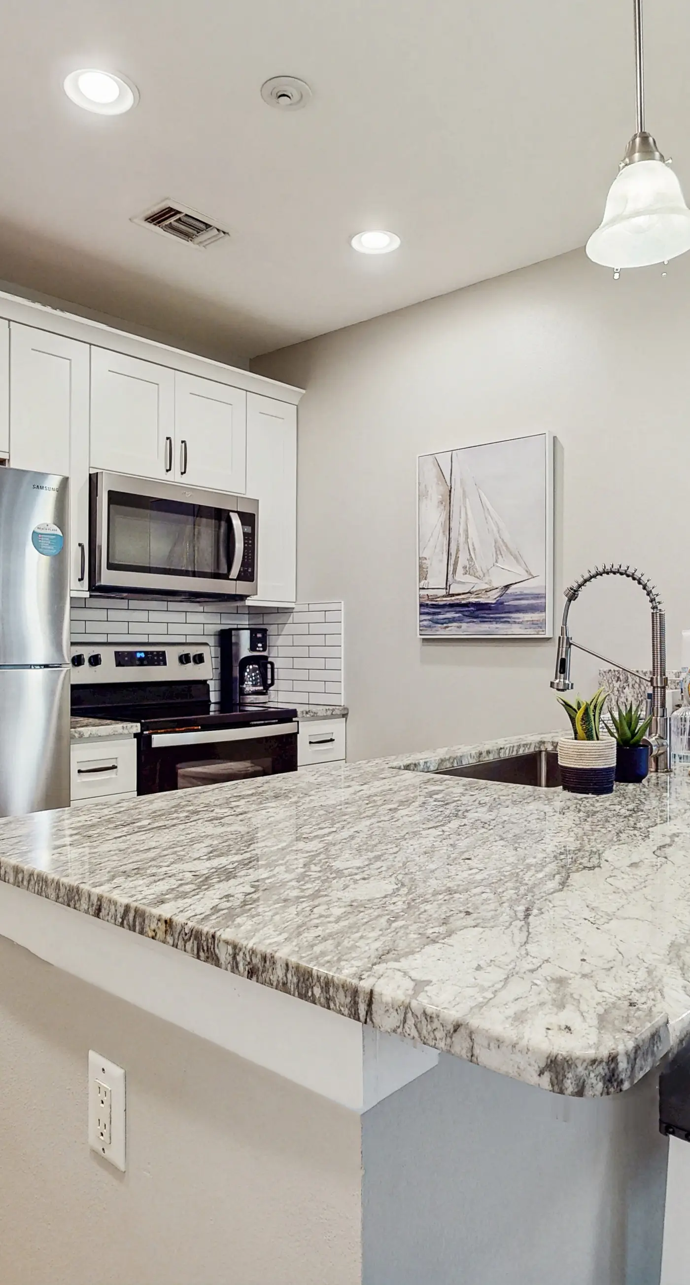 First-floor condo with a kitchen, patio, pool, hot tub, grill, & spa access