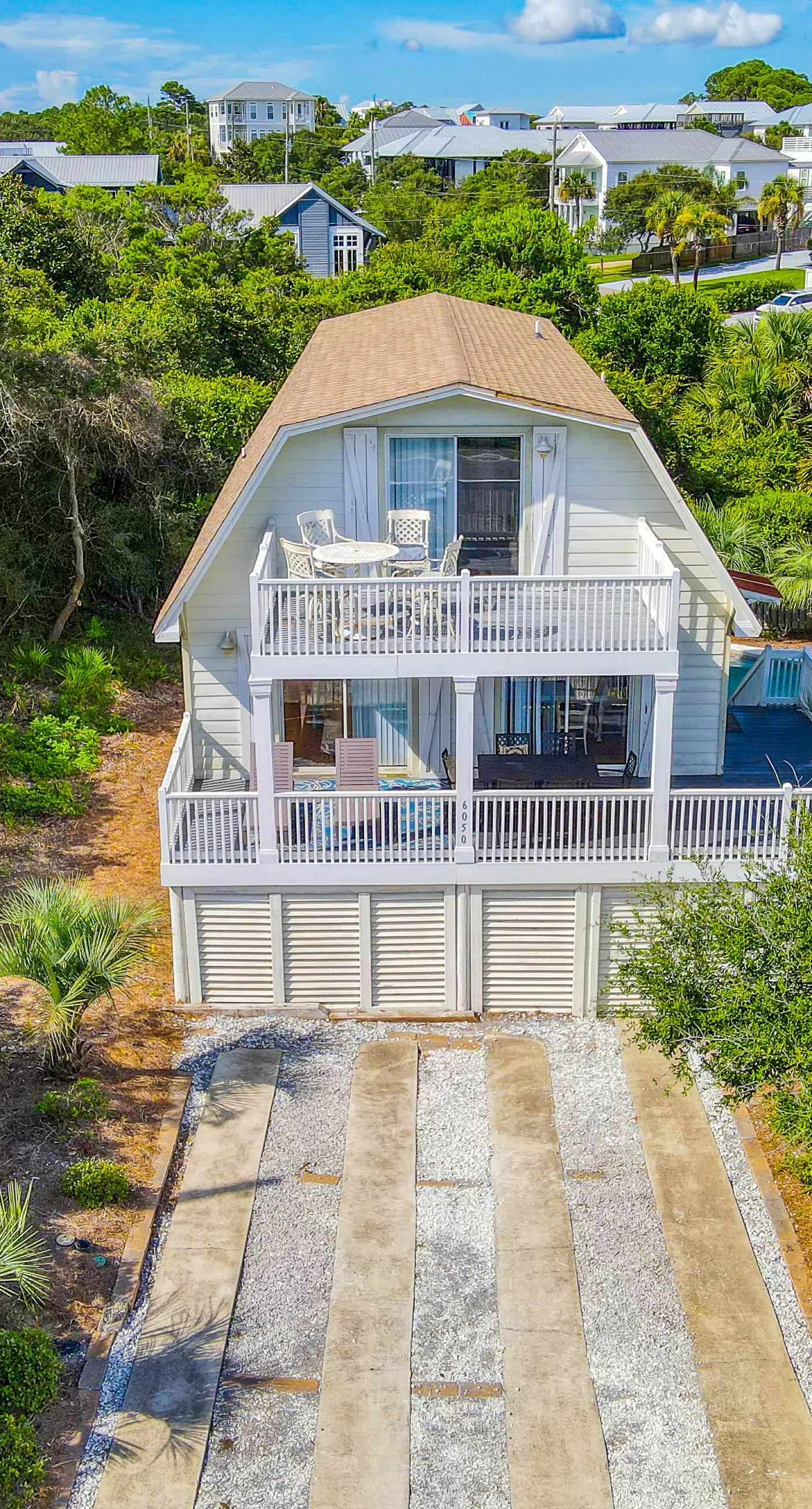 Dog-friendly, Gulf-view home with pool, decks, WiFi, & WD - walk to beach