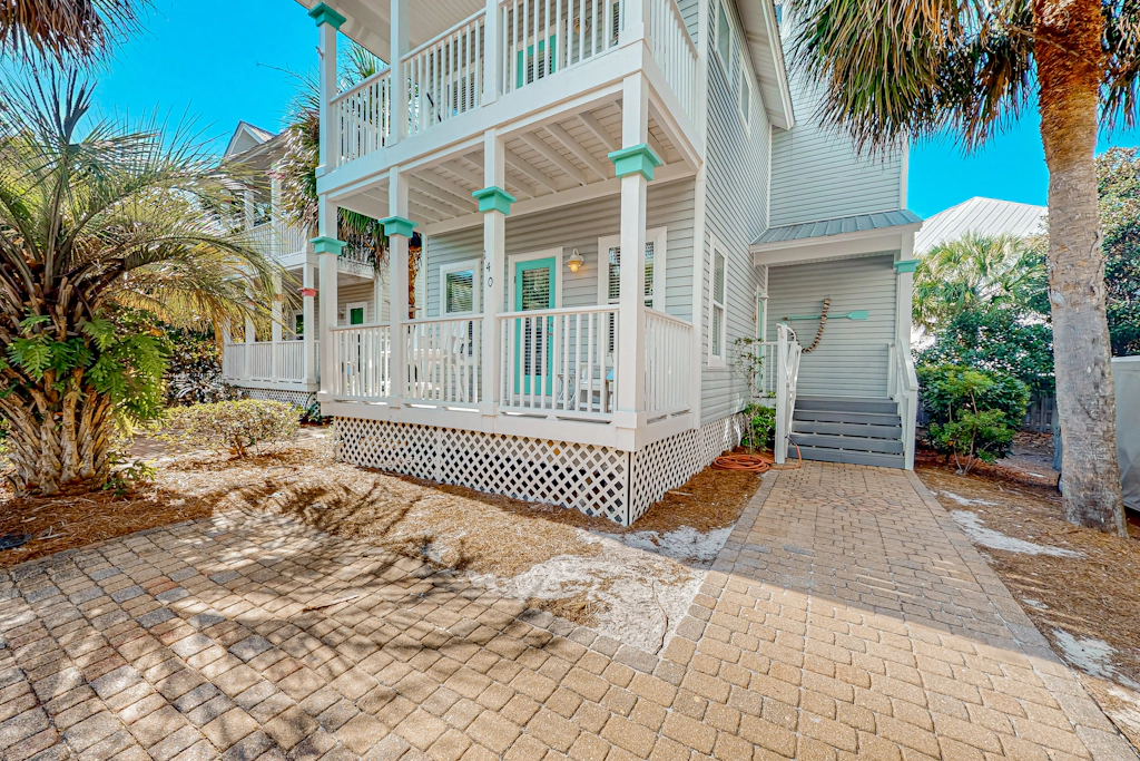 3-story home with heated outdoor pool, BBQ area, balconies, partial ocean views