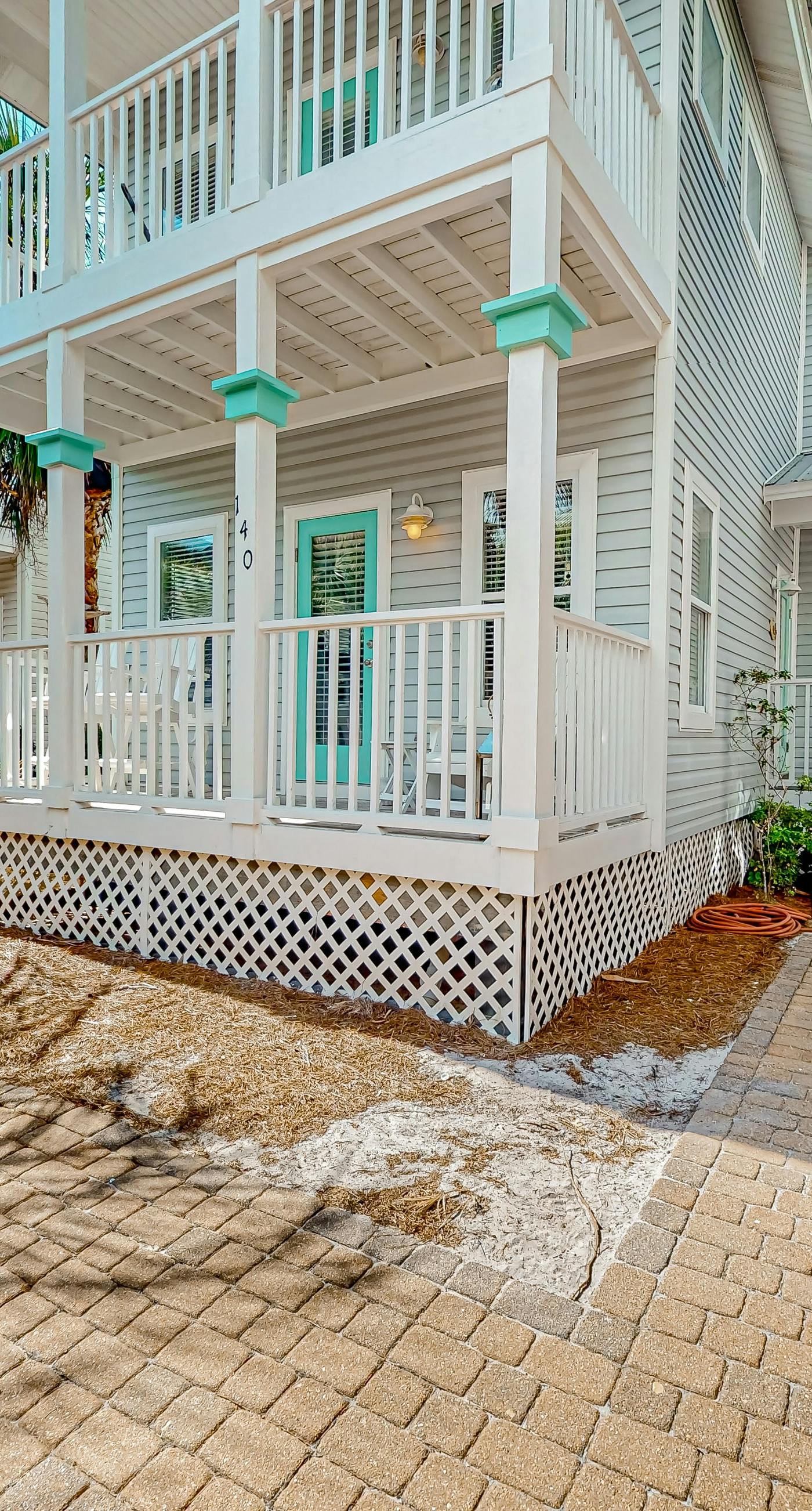 3-story home with heated outdoor pool, BBQ area, balconies, partial ocean views