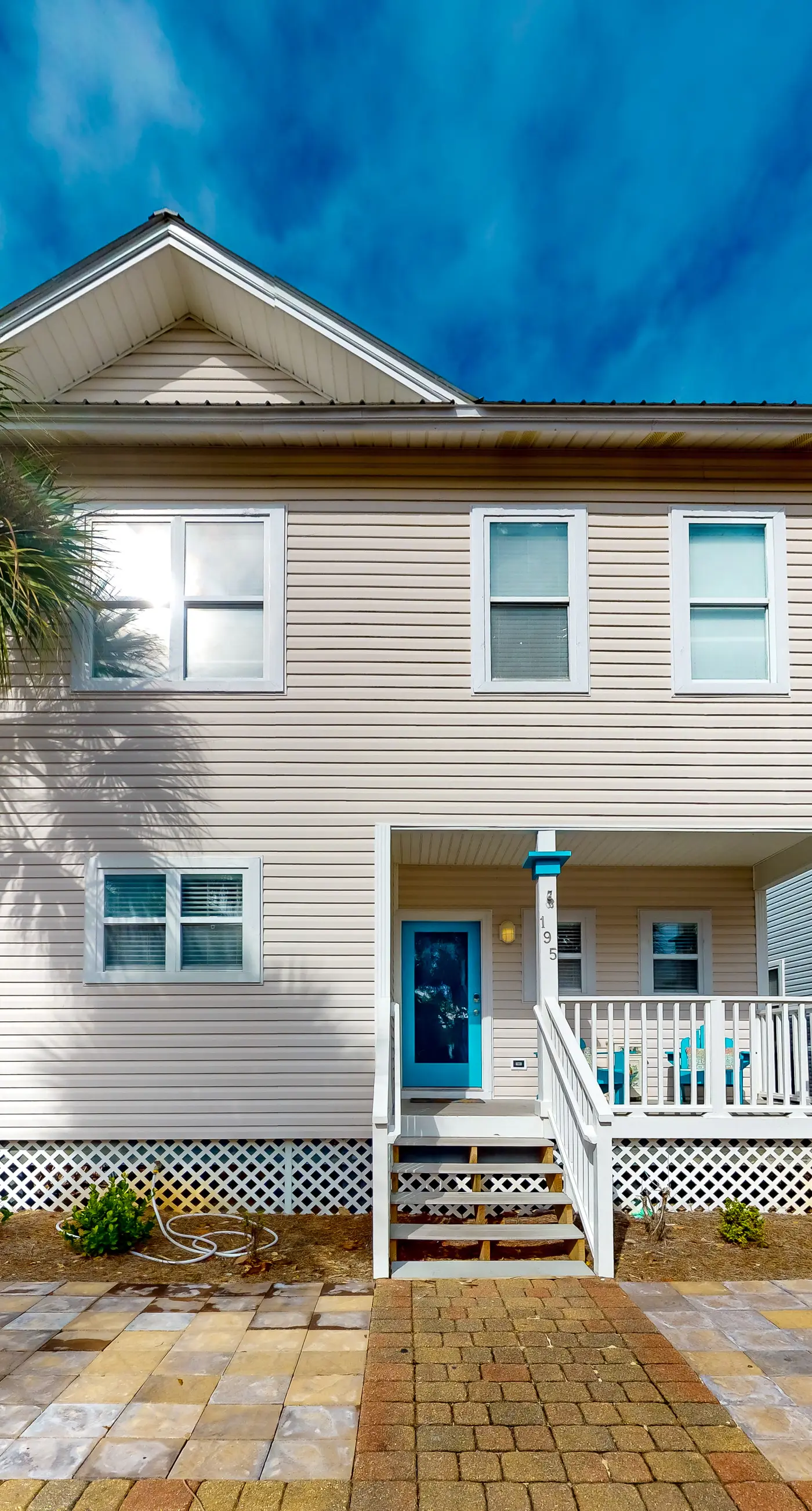 Inviting coastal property with spacious design and effortless beach access