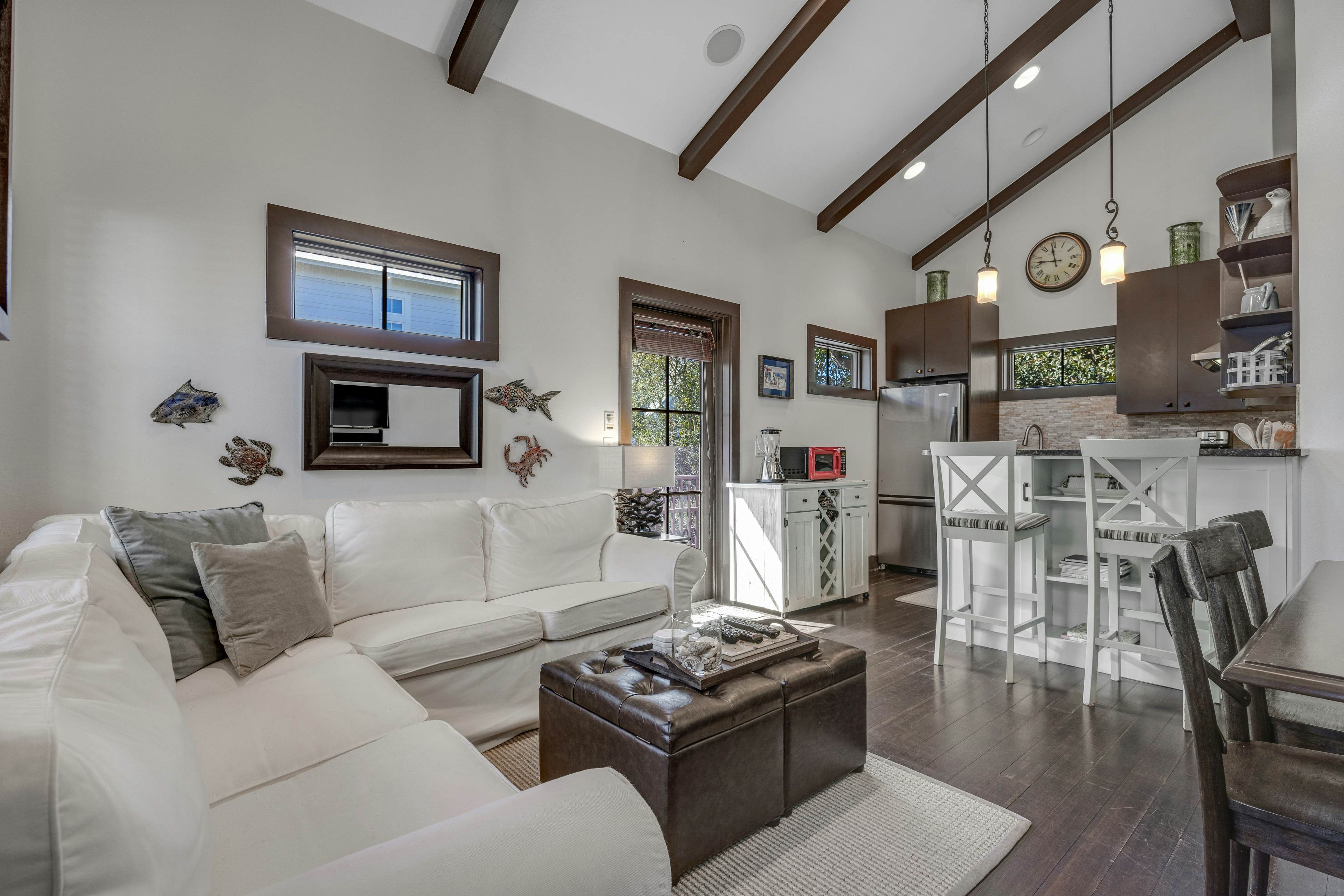 Home steps from the beach with plunge pool, gas grill, scenic balcony, & AC