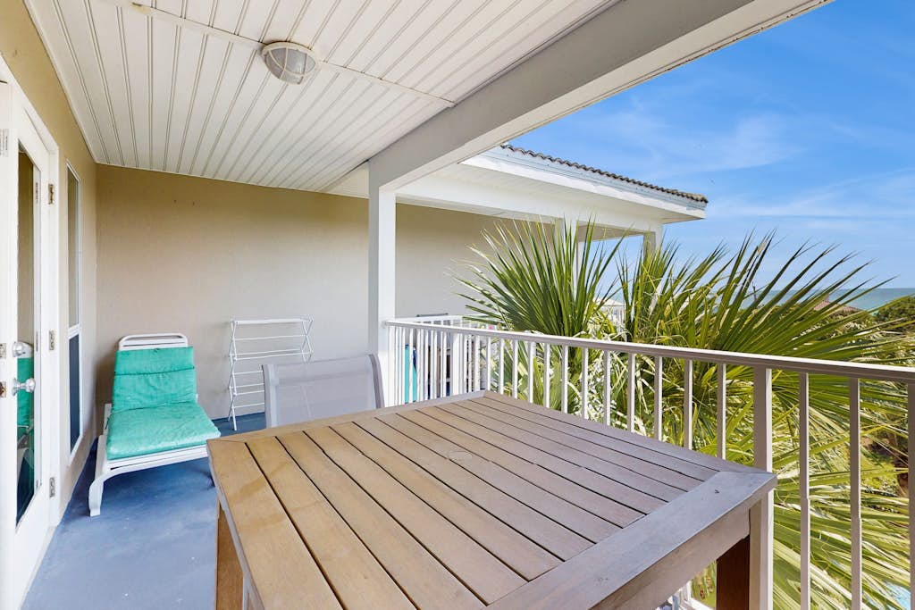 Fourth-floor, Caribbean corner condo with ocean views, pool, & hot tub