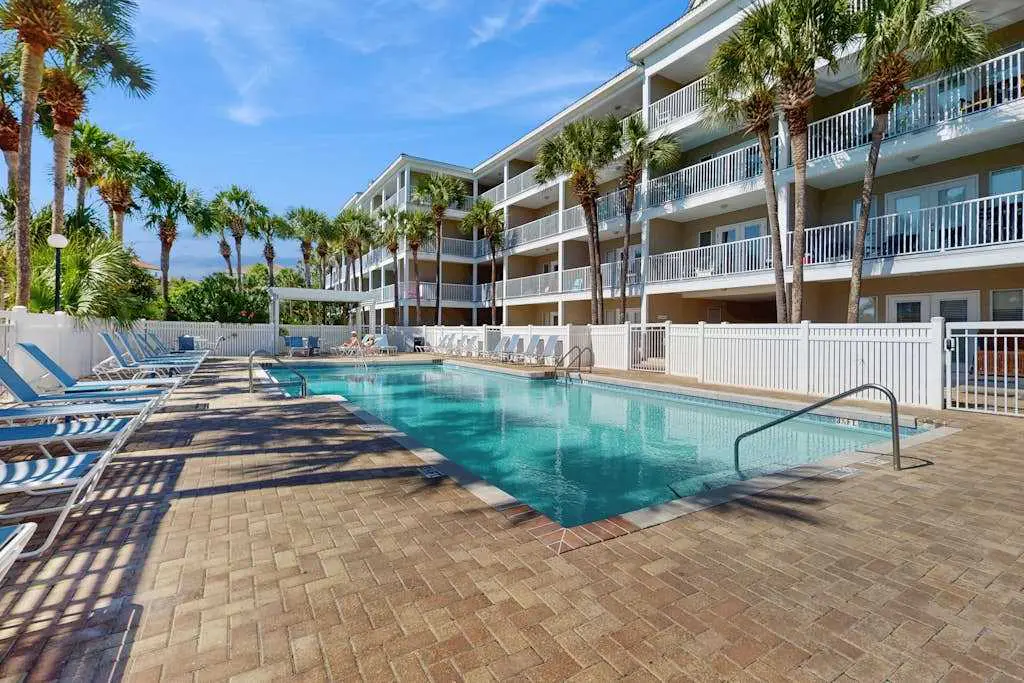 Fourth-floor, Caribbean corner condo with ocean views, pool, & hot tub