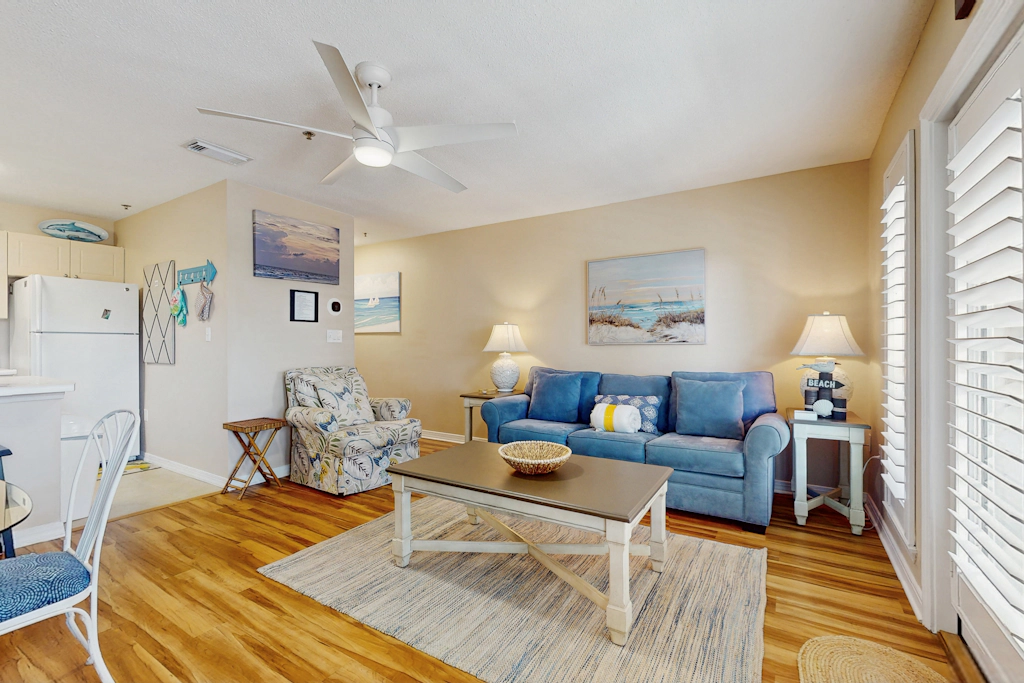 Bright, open 3rd-floor condo with pool views from private balcony - next to beach