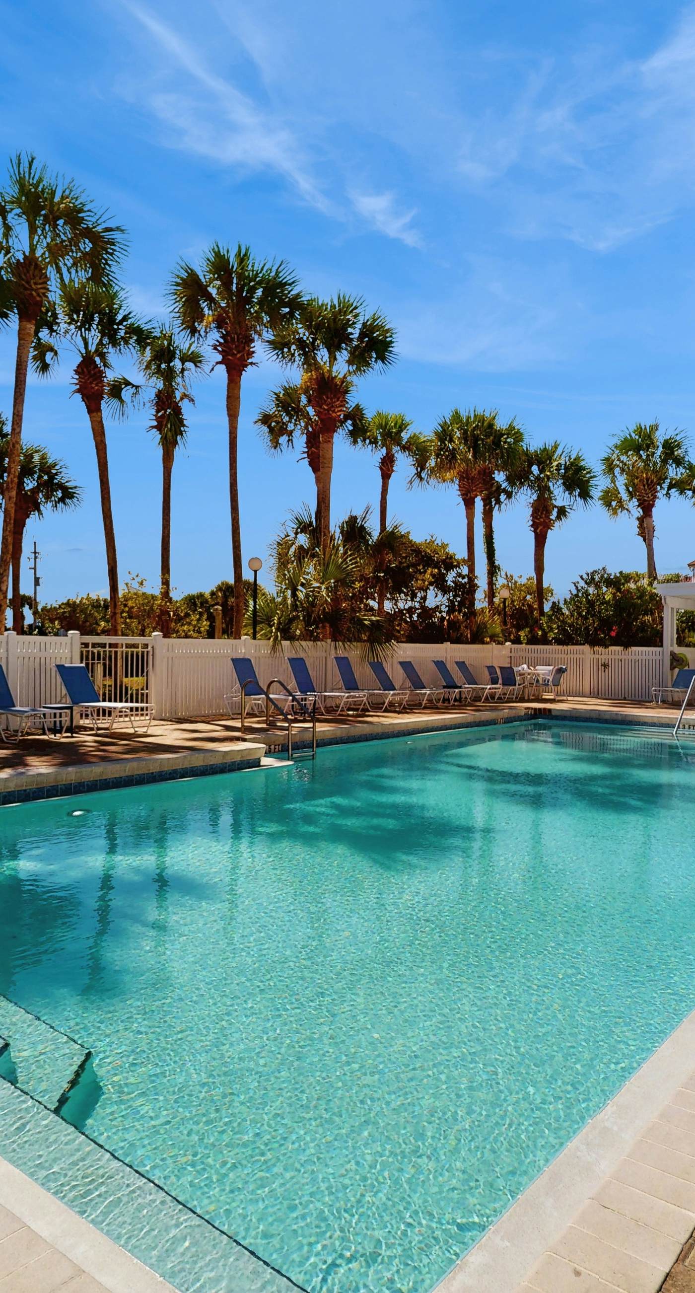 Bright, open 3rd-floor condo with pool views from private balcony - next to beach