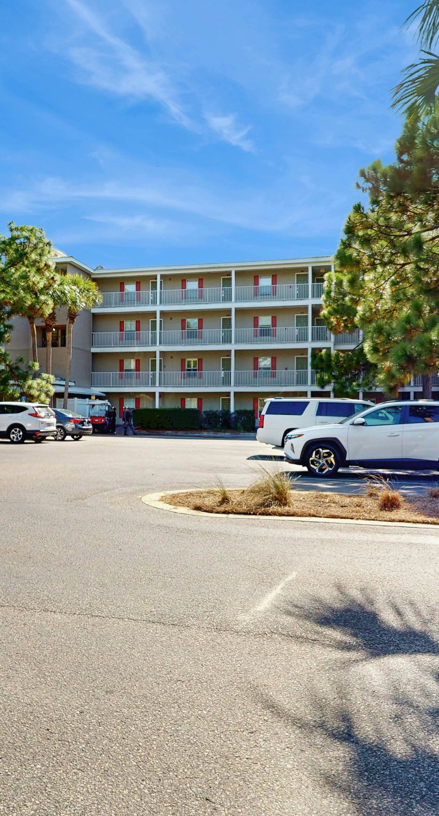 Bright, open 3rd-floor condo with pool views from private balcony - next to beach