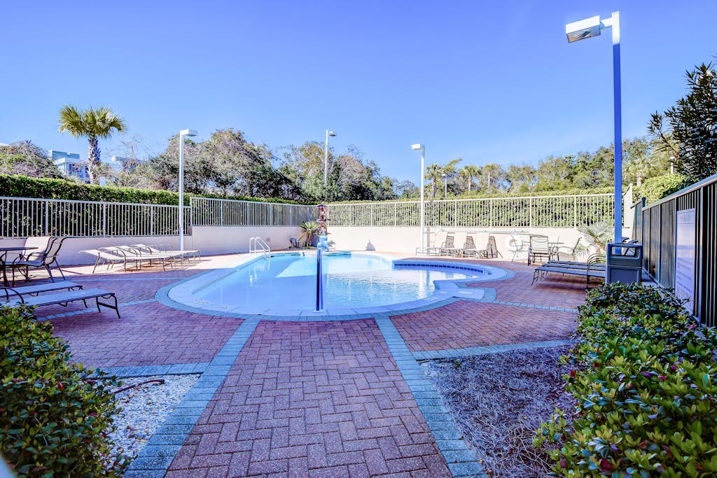 Stylish townhouse condo near the beach with full kitchen, WiFi, and shared pool