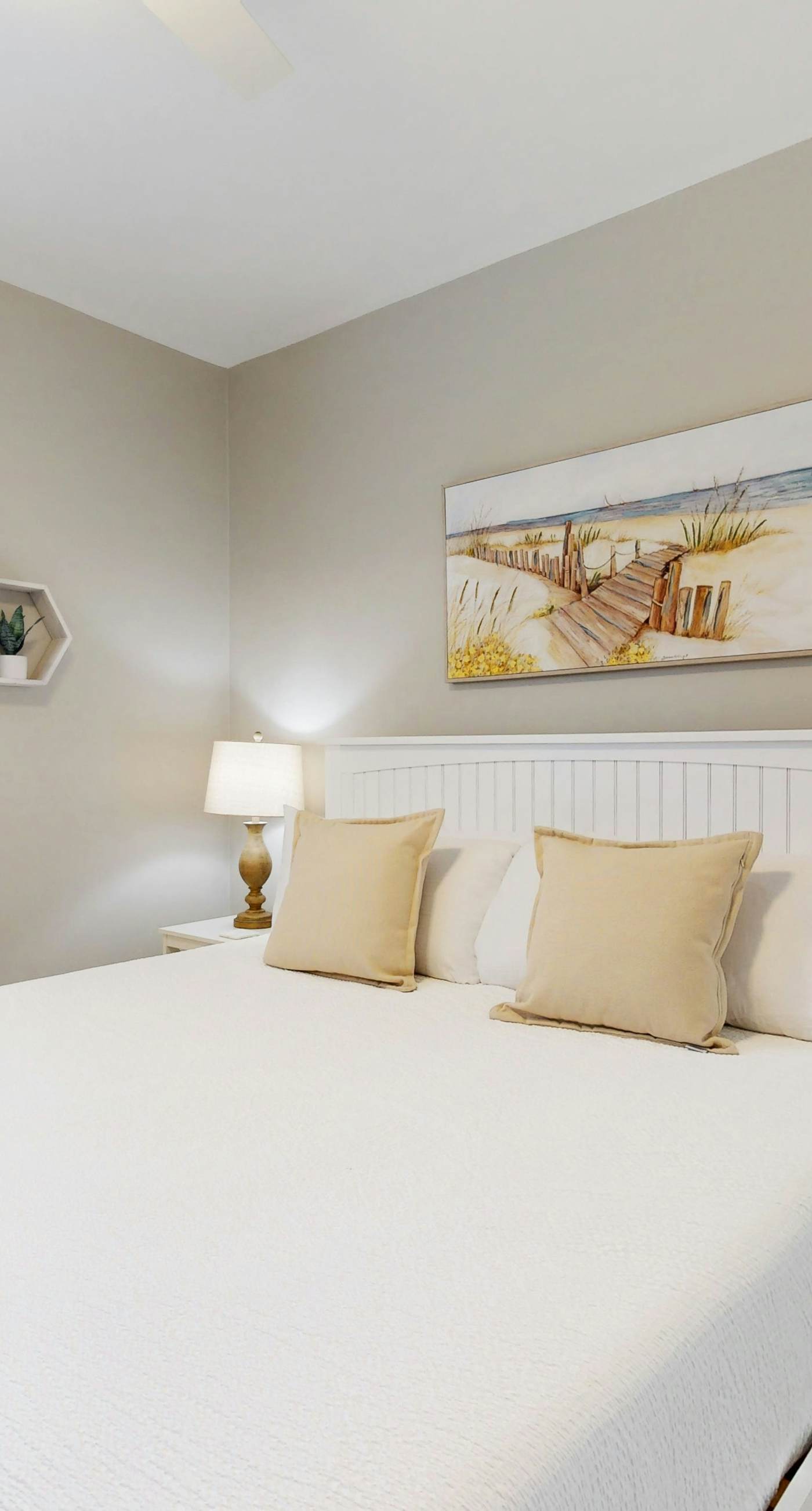 2nd-floor condo near beach with balcony, outdoor pool, streaming, & washer/dryer