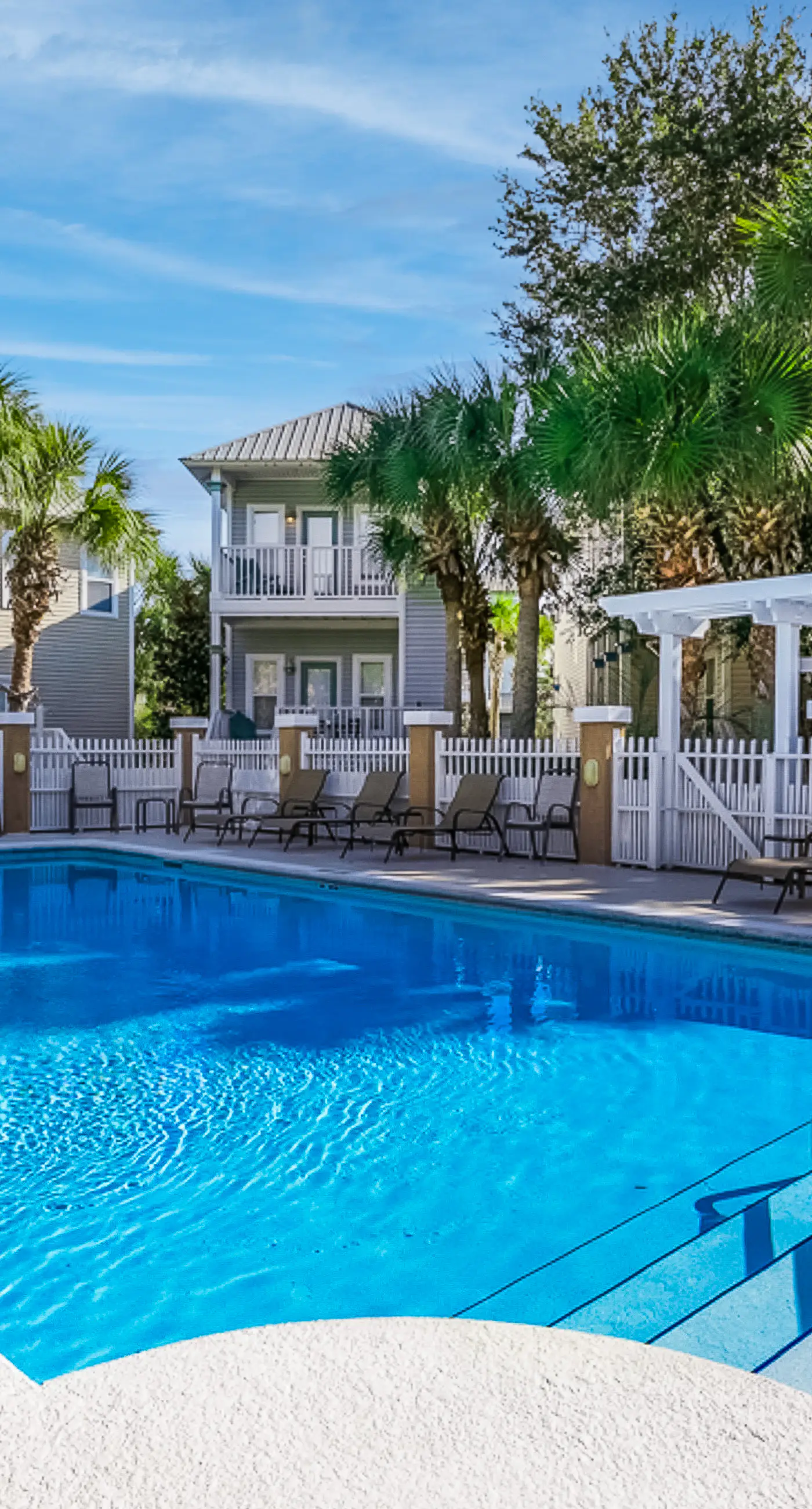 Charming getaway with lovely porches & shared pool - walk to the beach