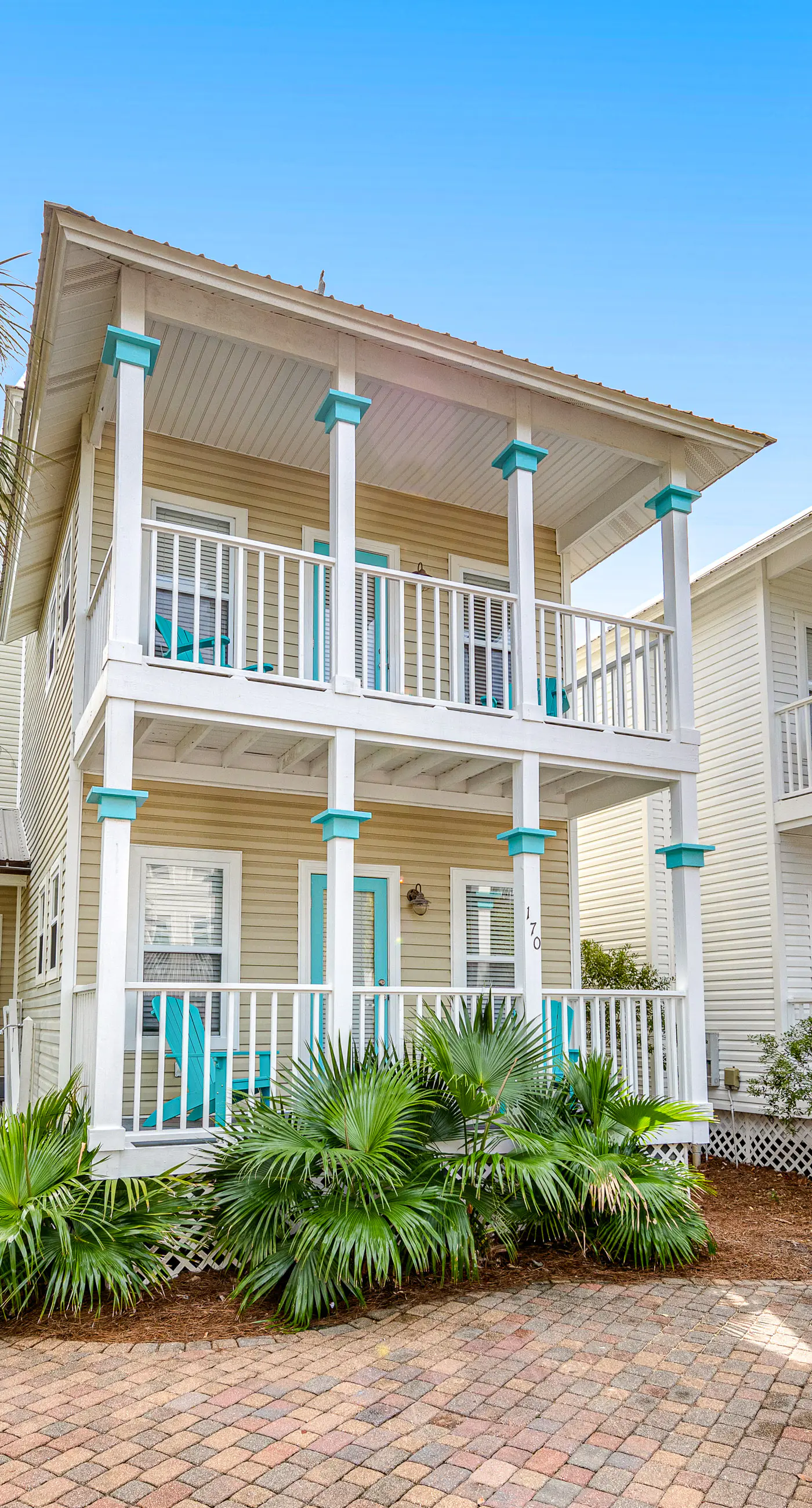Charming getaway with lovely porches & shared pool - walk to the beach