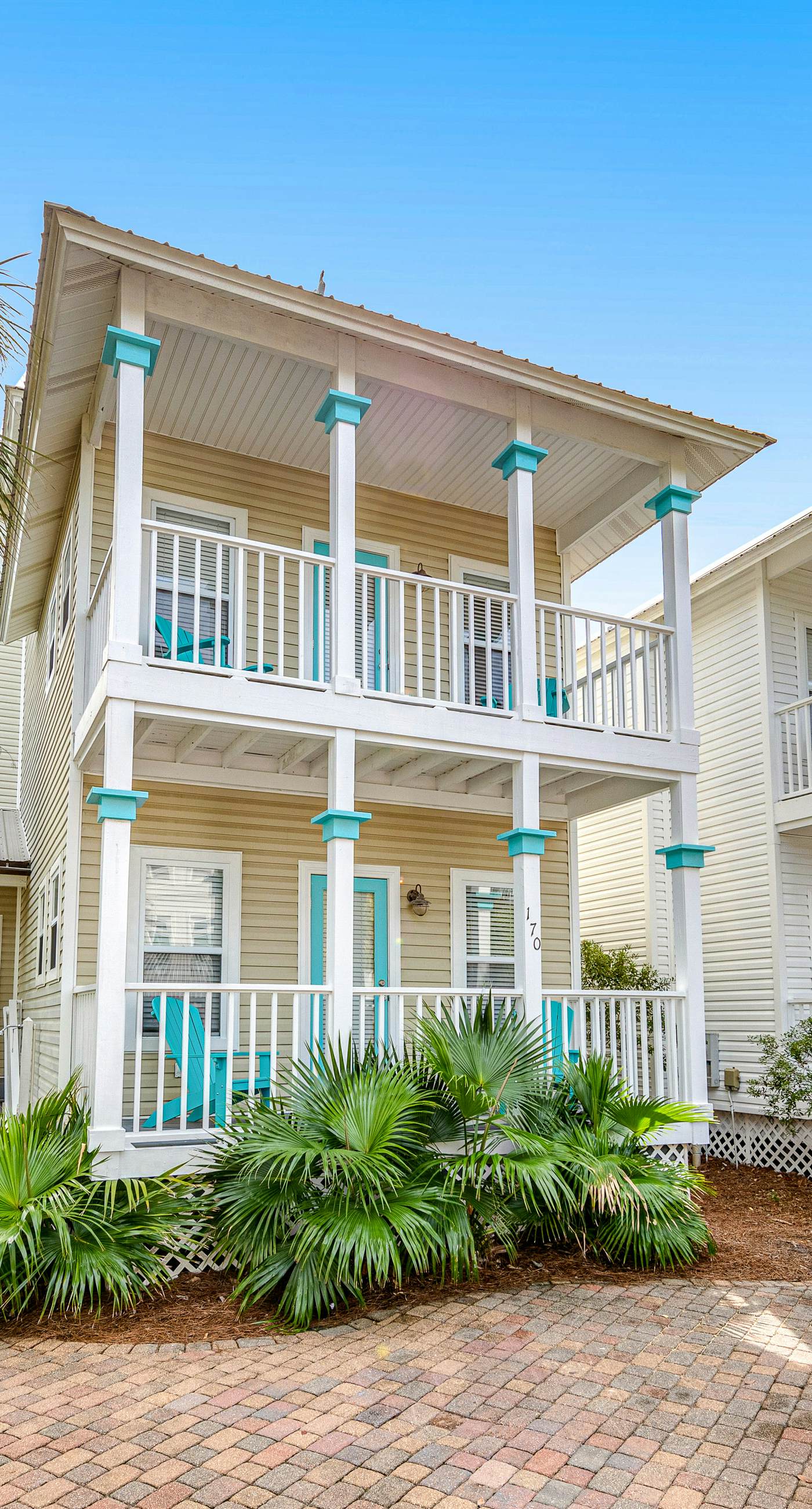 Charming getaway with lovely porches & shared pool - walk to the beach