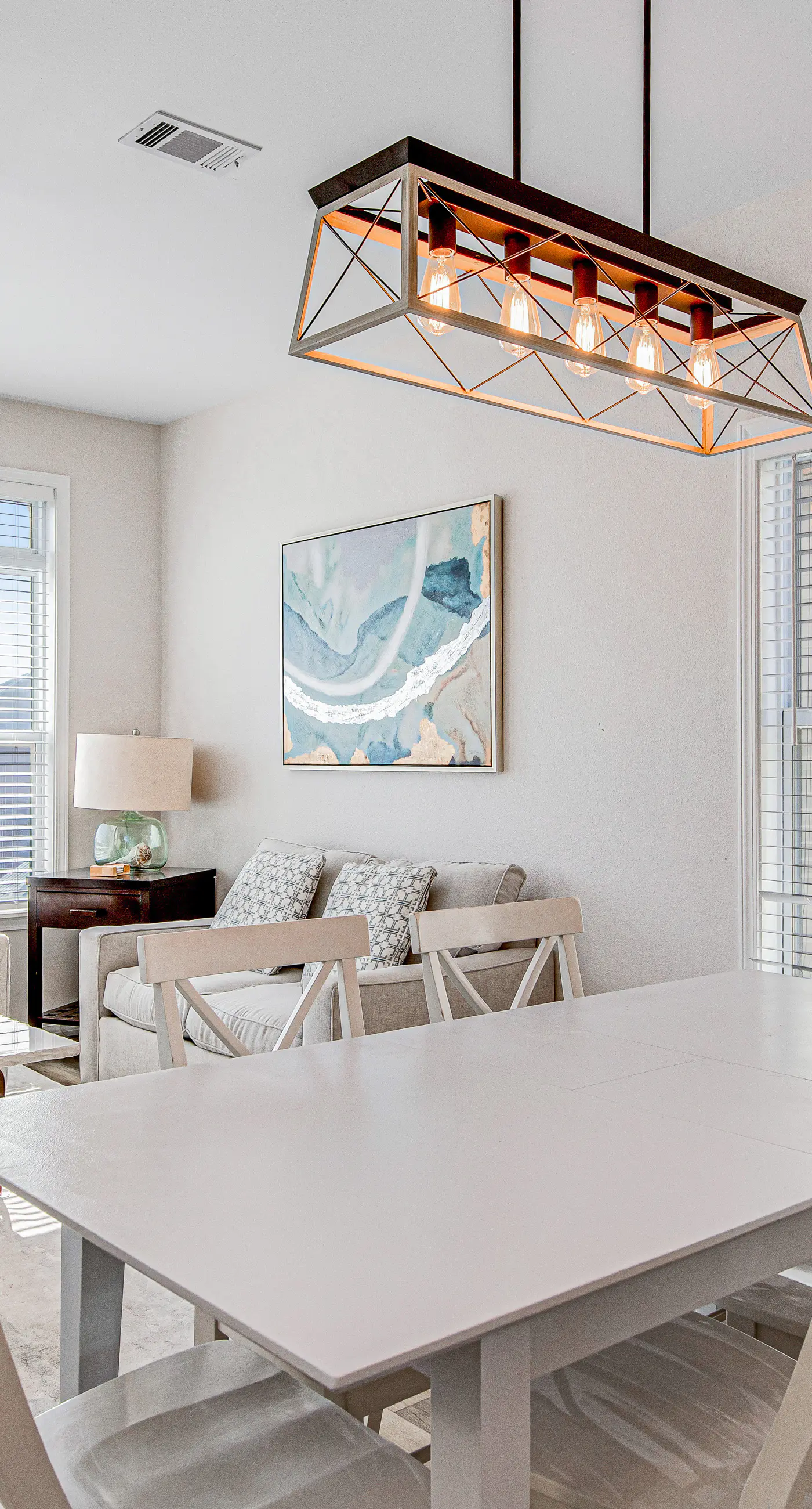 Charming getaway with lovely porches & shared pool - walk to the beach