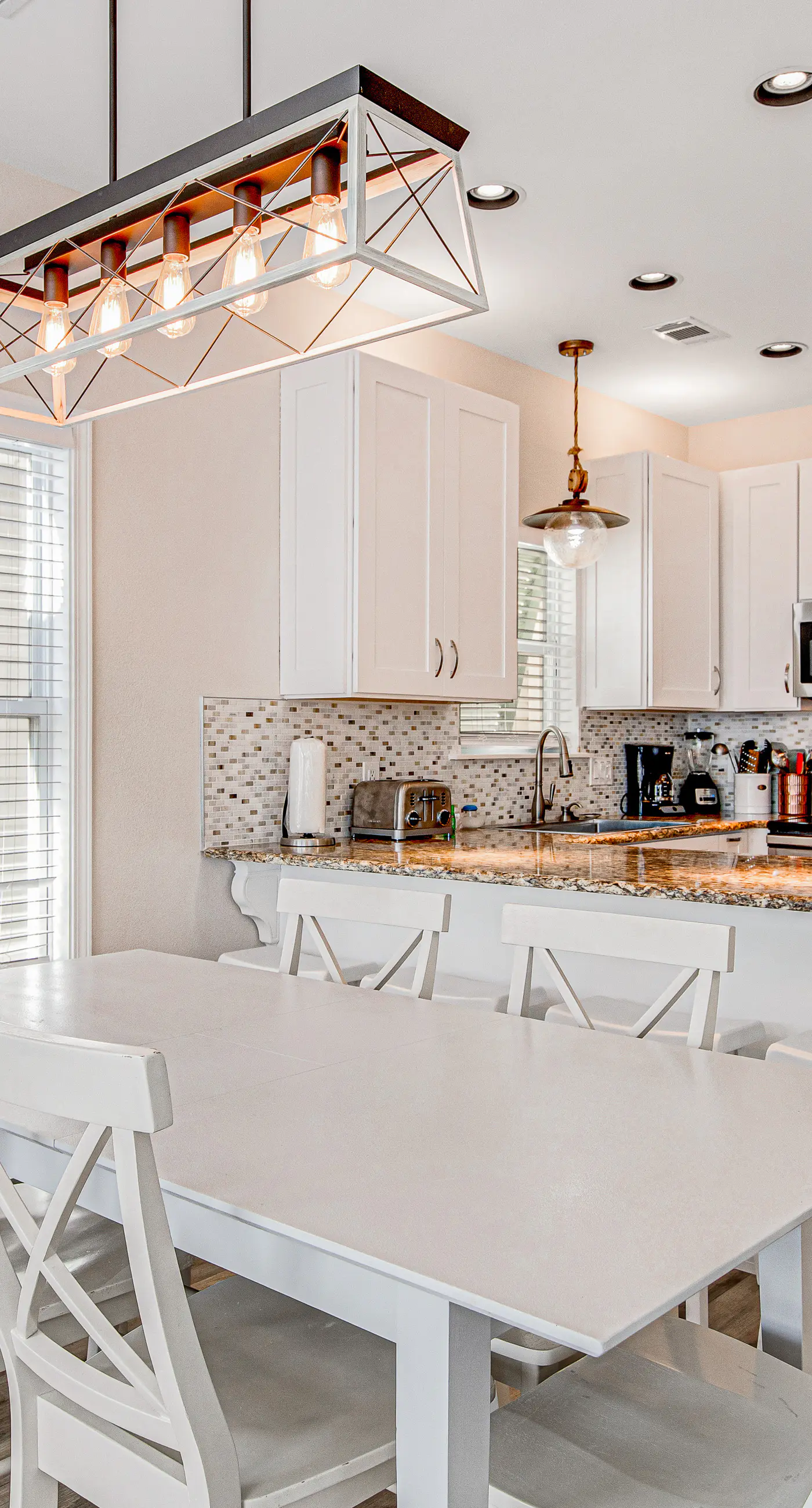 Charming getaway with lovely porches & shared pool - walk to the beach