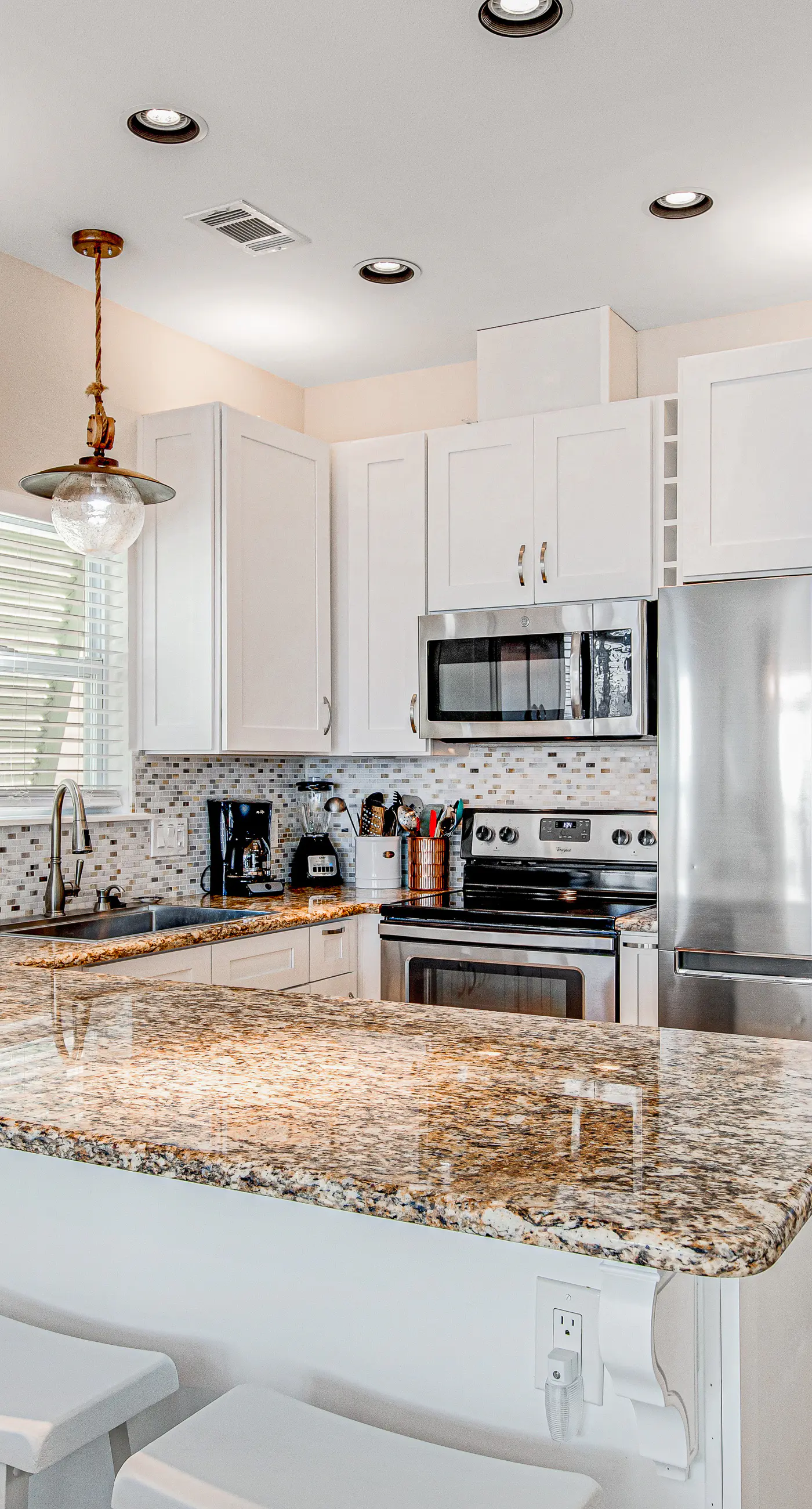 Charming getaway with lovely porches & shared pool - walk to the beach