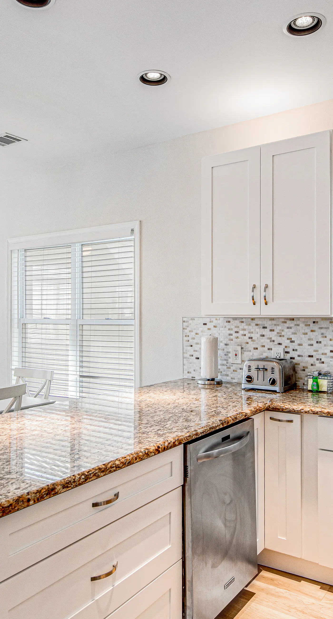 Charming getaway with lovely porches & shared pool - walk to the beach