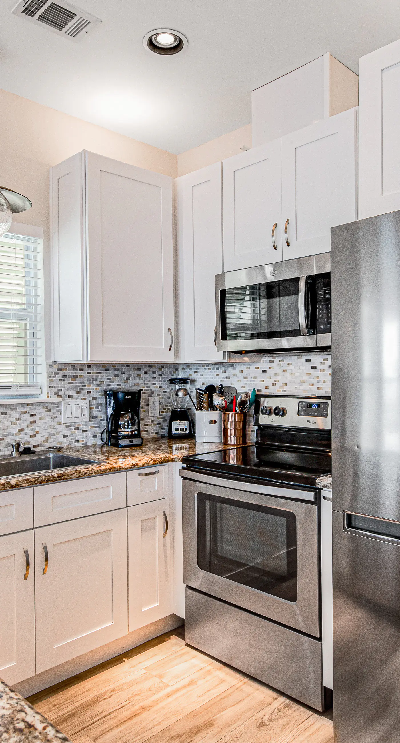 Charming getaway with lovely porches & shared pool - walk to the beach